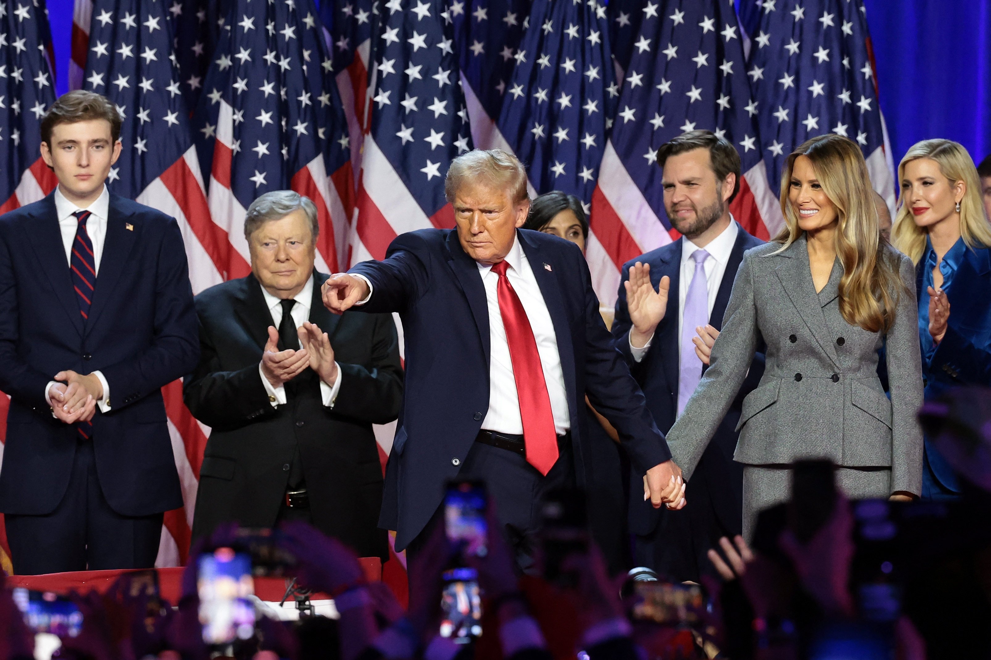 Donald Trump pointed to supporters in West Palm Beach, Florida, on election night. Photo: Getty Images via AFP