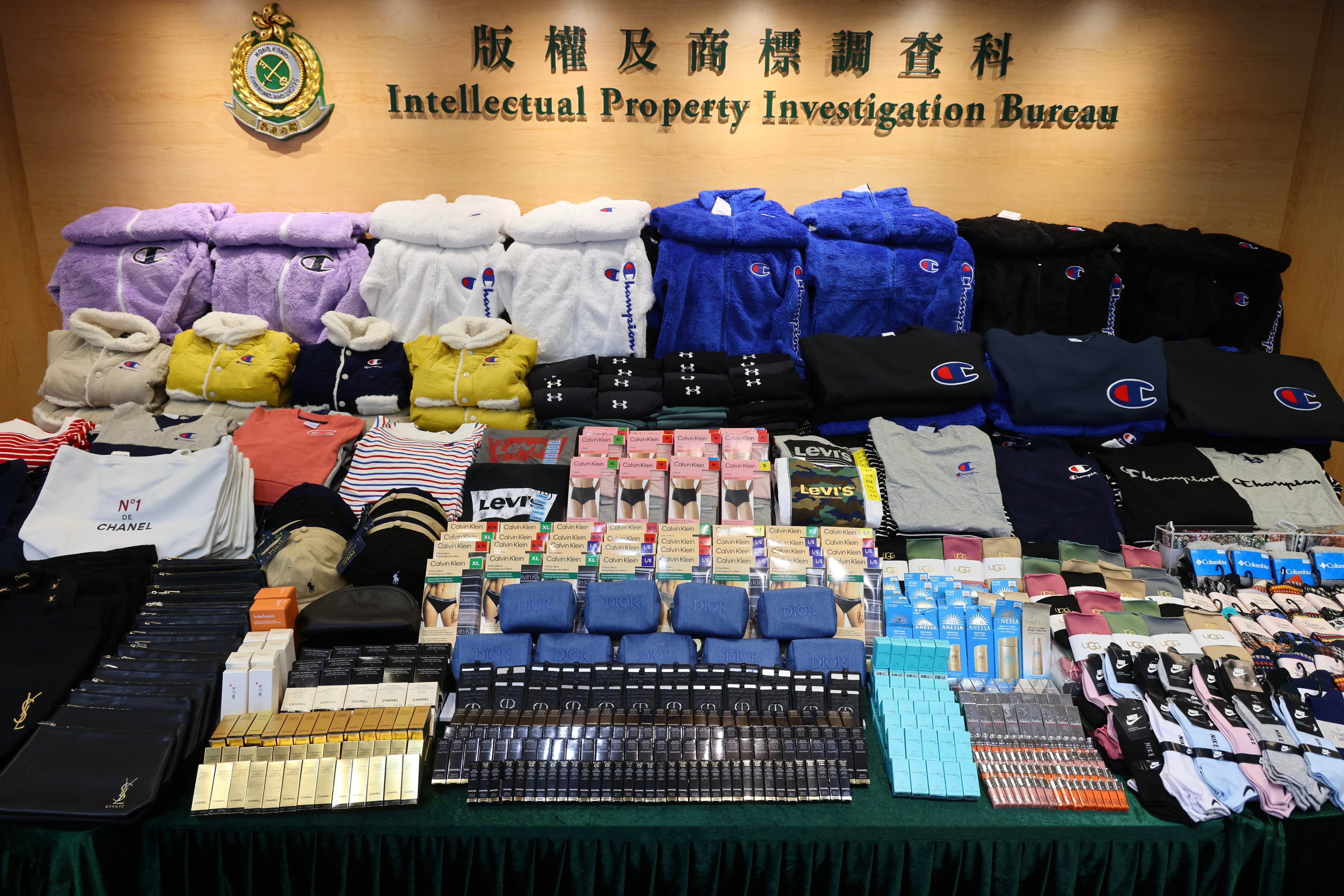 The Customs and Excise Department displays goods seized during the raid carried out earlier this week. Photo:  Dickson Lee