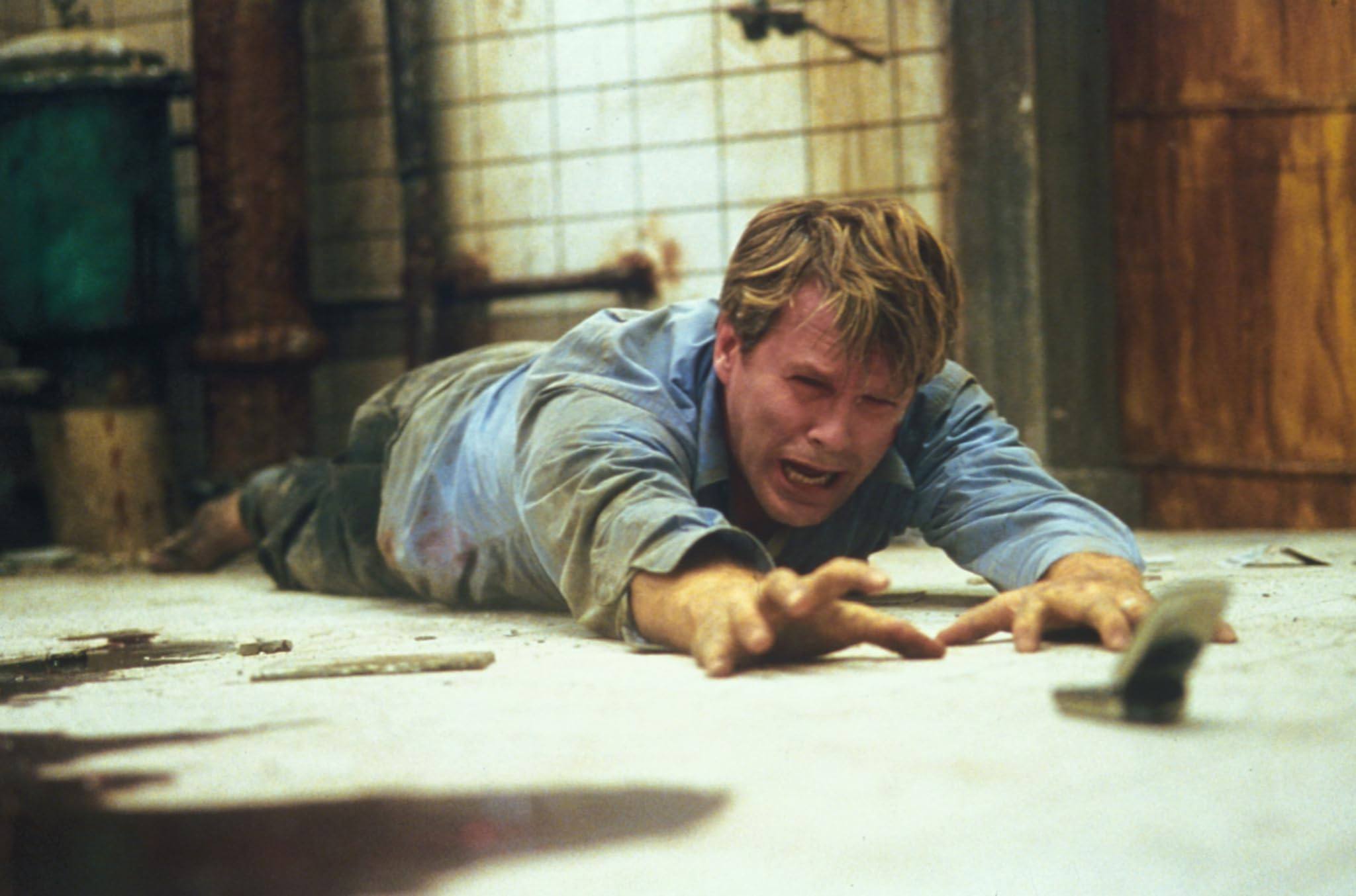 Cary Elwes as oncologist Dr Lawrence Gordon in a still from Saw (2004). Photo: Lionsgate Films