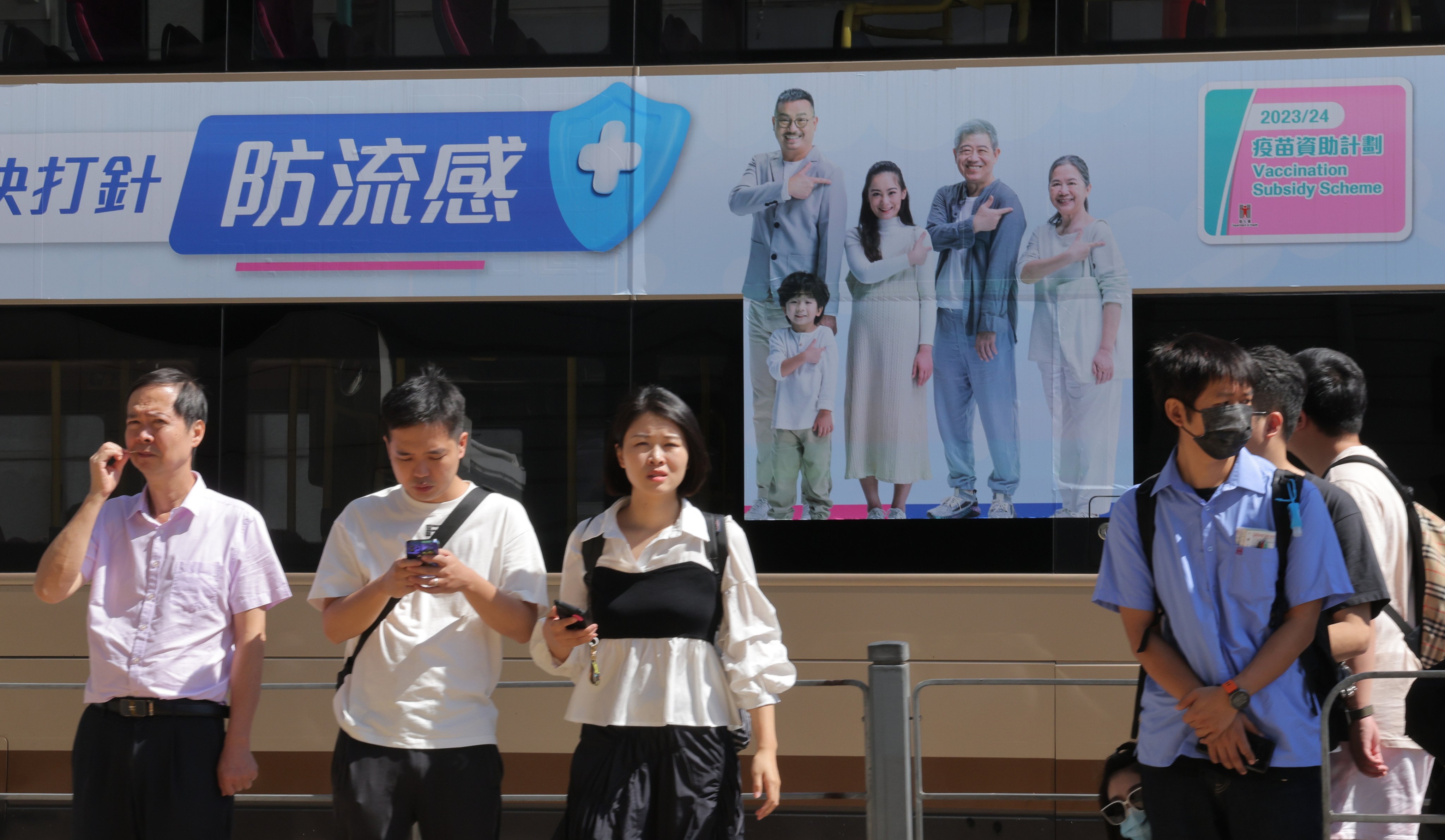 A bus advertisement from the Department of Health calls for the public to get their flu shot. Photo: Jelly Tse