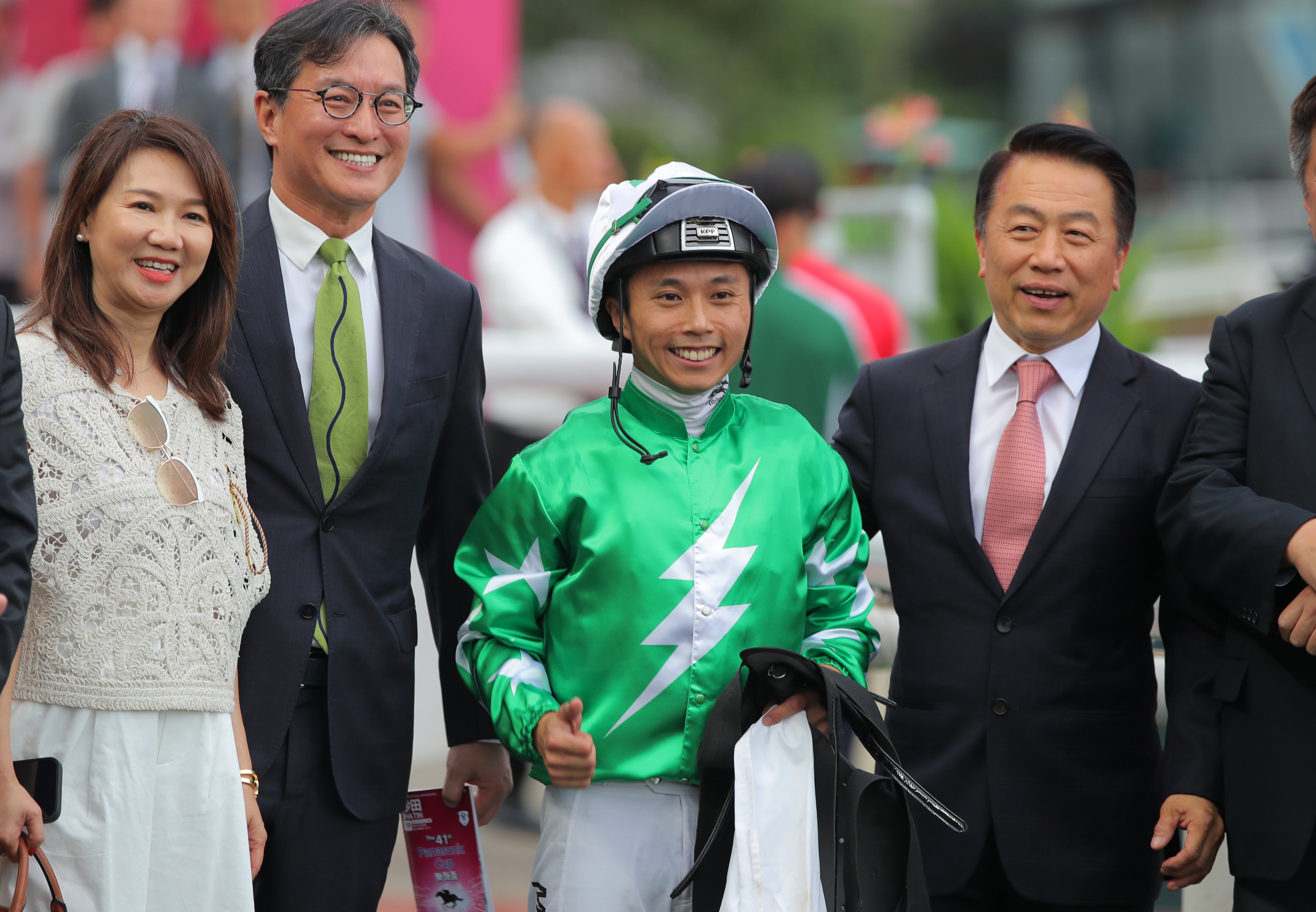 Jockey Matthew Poon, trainer Ricky Yiu (right) and connections celebrate Green N White’s Sha Tin victory. Photos: Kenneth Chan