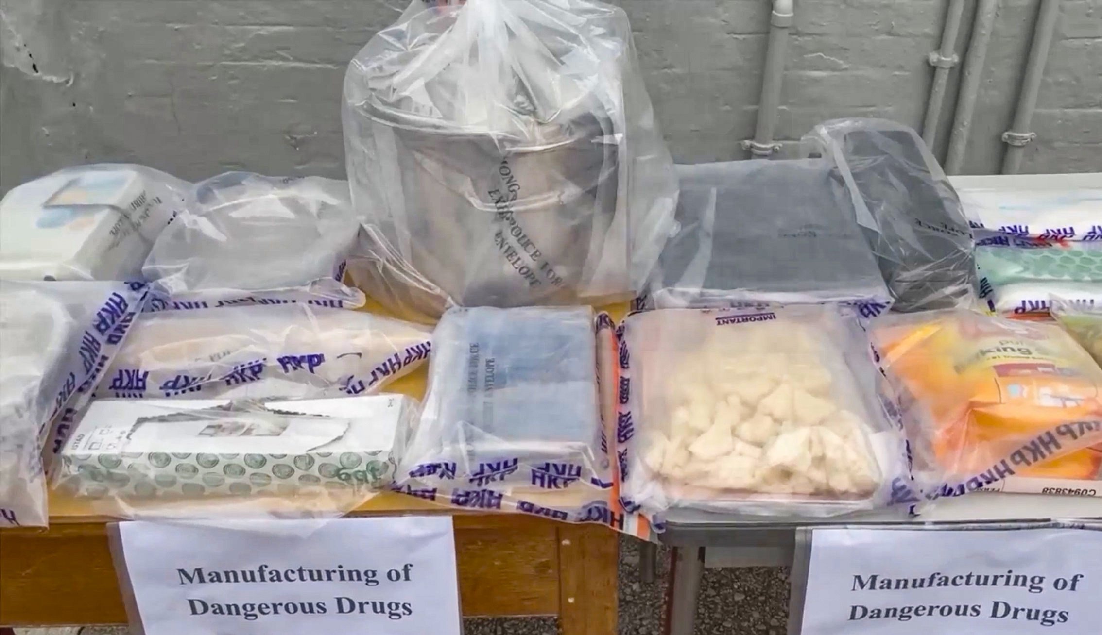 Officers discovered 1.29kg of crack cocaine, 1.09kg of cocaine, as well as suspected raw materials for drug production in the village house. Photo: Handout