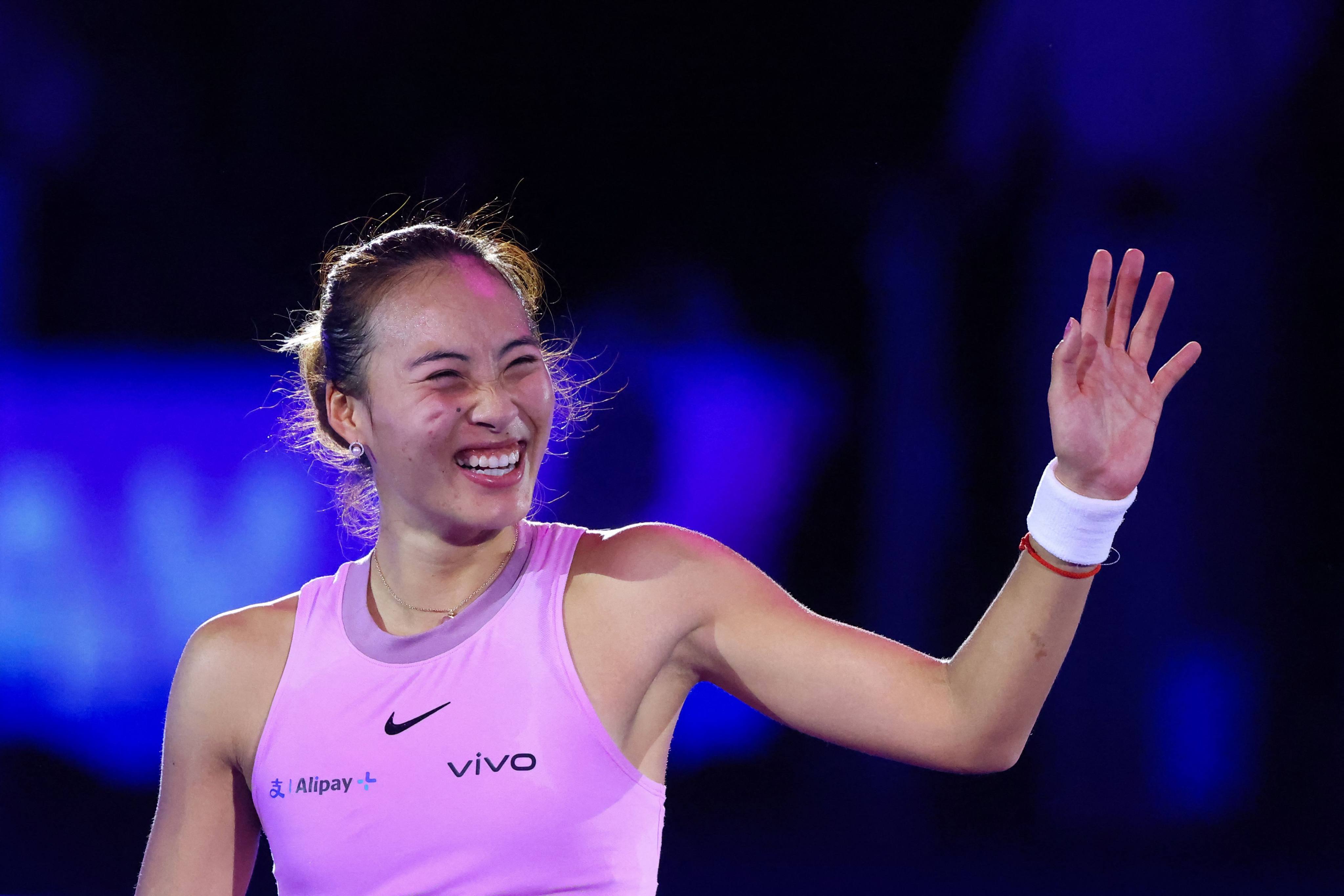 China’s Zheng Qinwen gives her fans a big smile after winning her WTA Finals semi-final. Photo: AFP