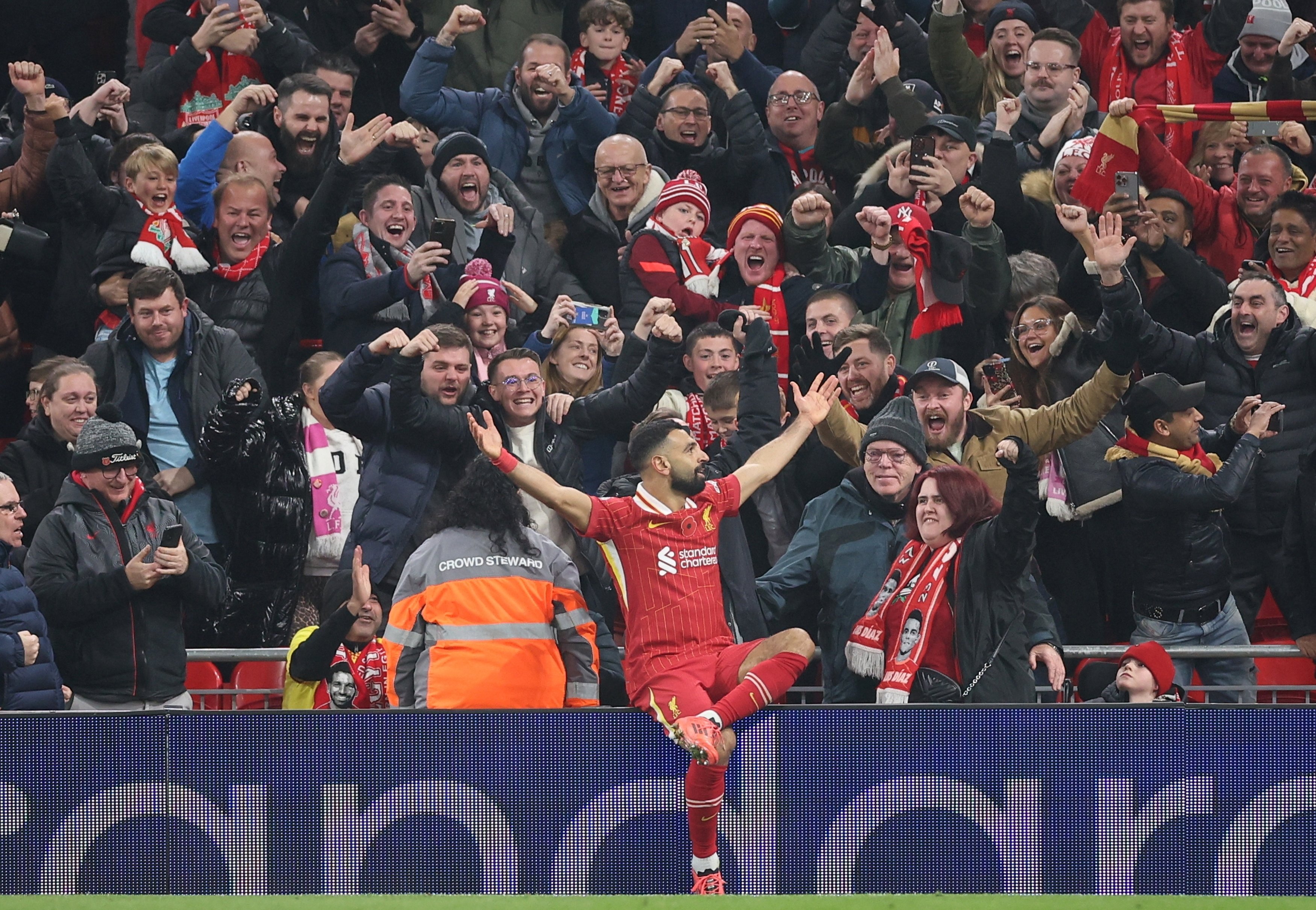 Liverpool’s Mohamed Salah celebrates after scoring his side’s second against Aston Villa at Anfield. Photo: EPA-EFE