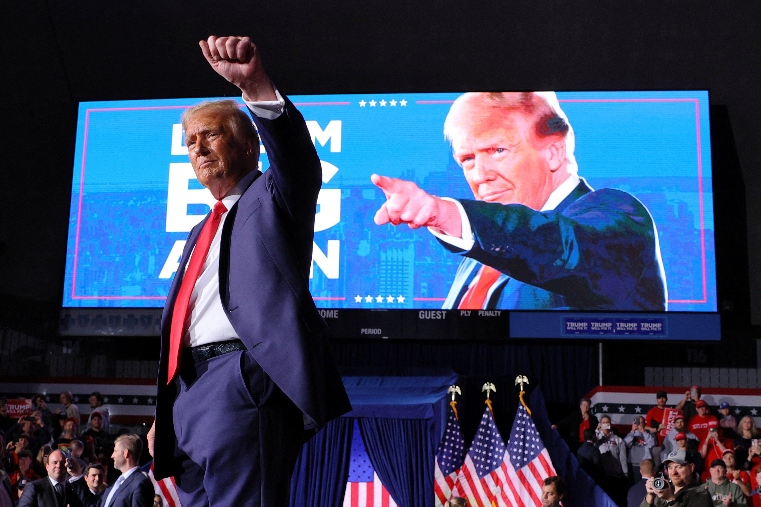 US president-elect Donald Trump gestures to the crowd at the conclusion of his final rally of the campaign at Van Andel Arena in Grand Rapids, Michigan on November 5, 2024. Photo: Reuters