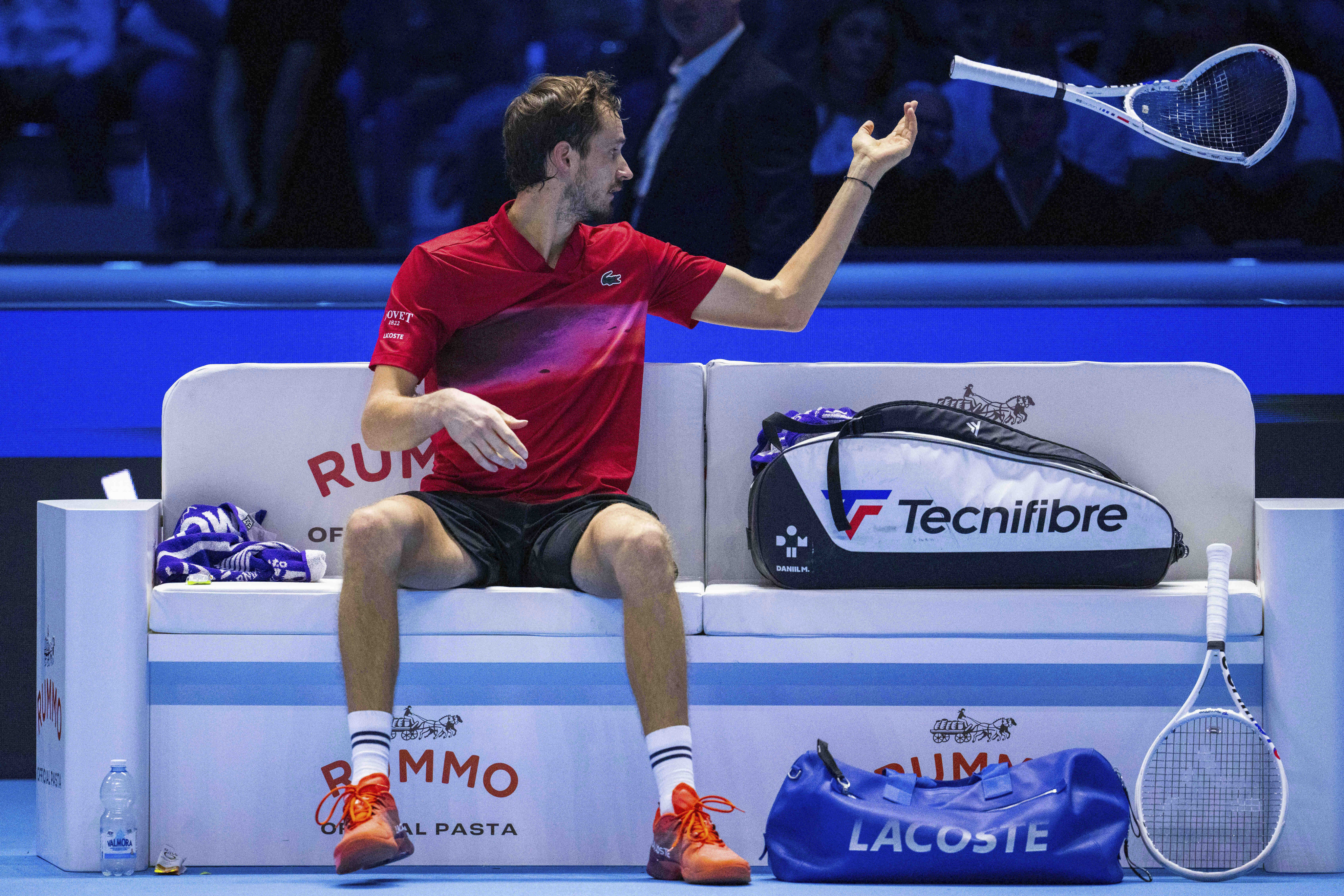 Daniil Medvedev throws aside a racquet he had just broken in anger during his ATP Finals match against Taylor Fritz on Sunday. Photo: AP