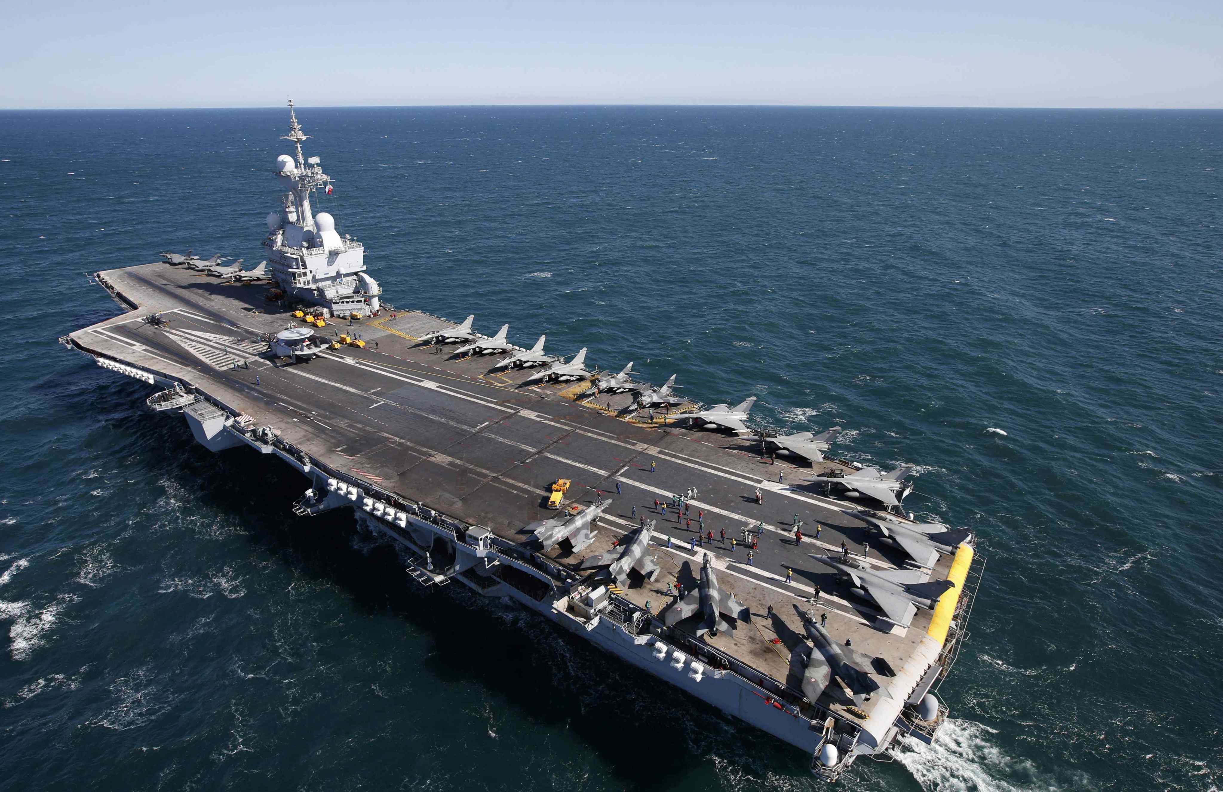 Rafale and Super Etendards fighter jets are seen on board France’s Charles de Gaulle aircraft carrier. Photo: Reuters