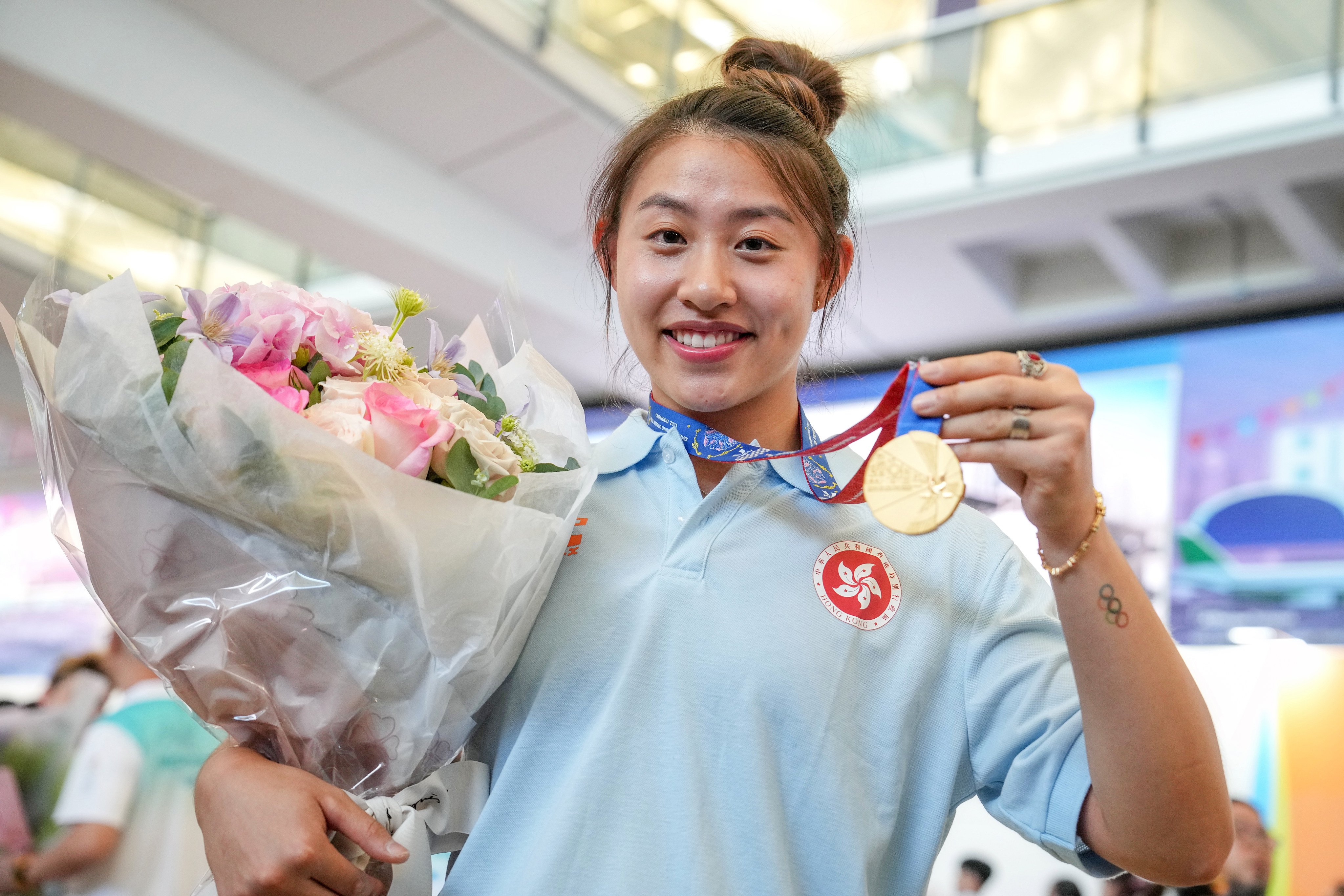 Kaylin Hsieh arrives back in  Hong Kong after the successful World University Games in Chengdu last year. Photo: Elson Li