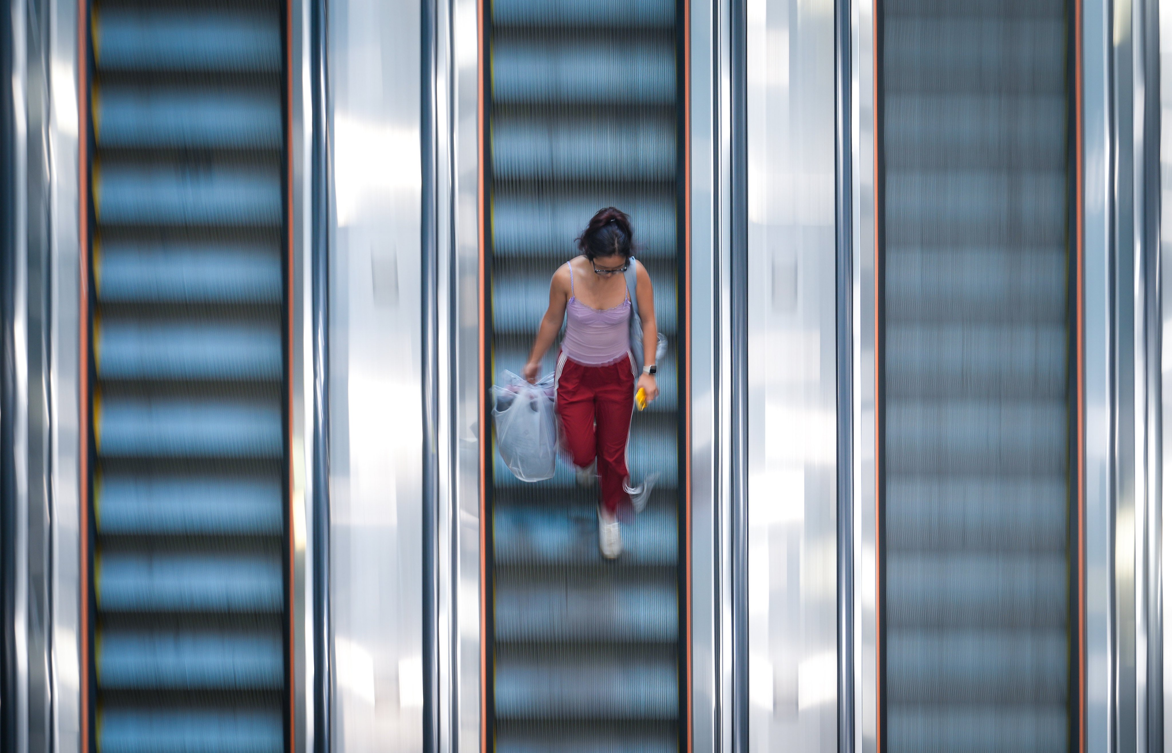 A passenger walks down an escalator in Admiralty MTR Station on November 11. Photo: Sam Tsang