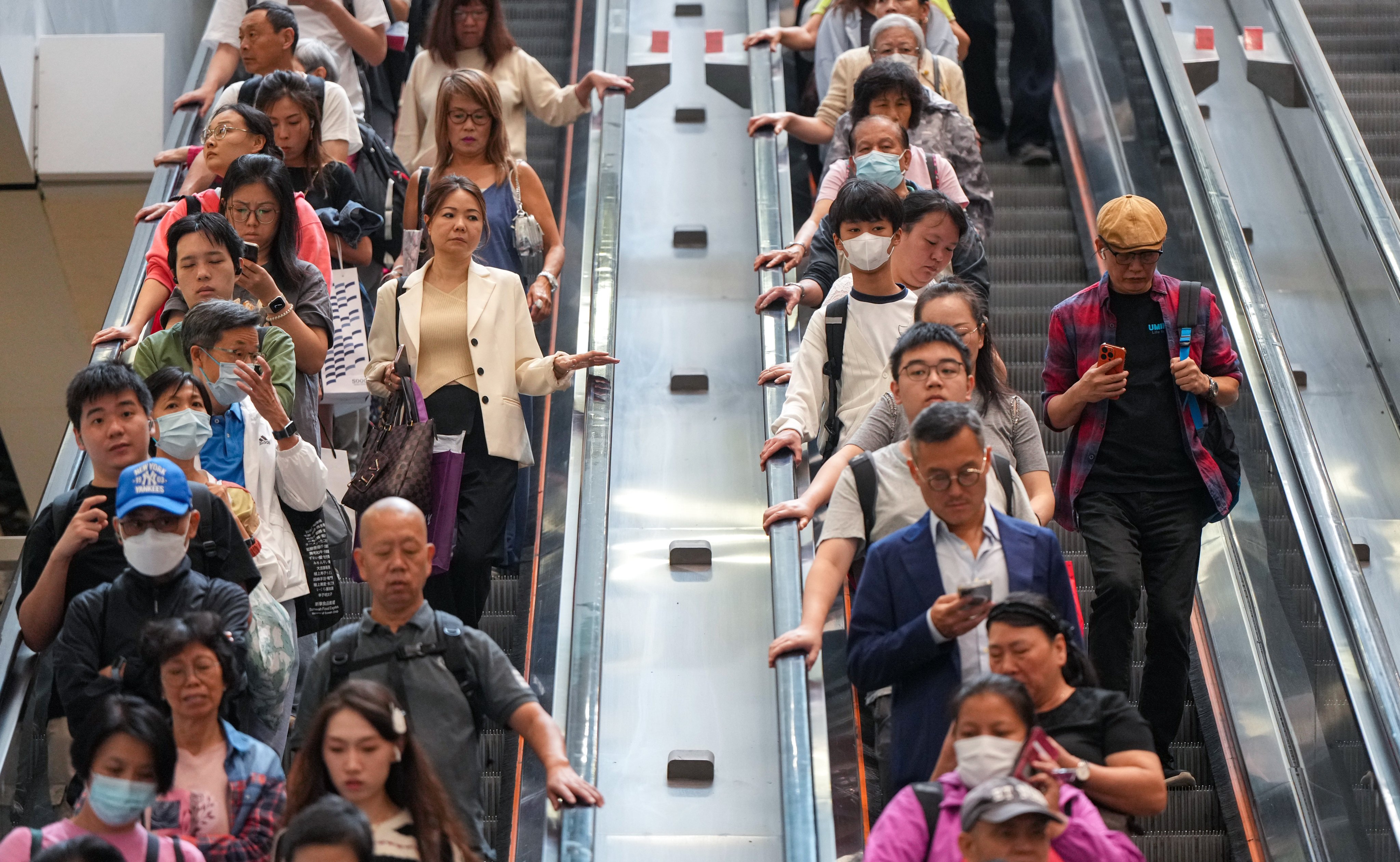 Hong Kong’s MTR is urging passengers to stand still on escalators, citing safety concerns and a rise in accidents. Photo: Sam Tsang