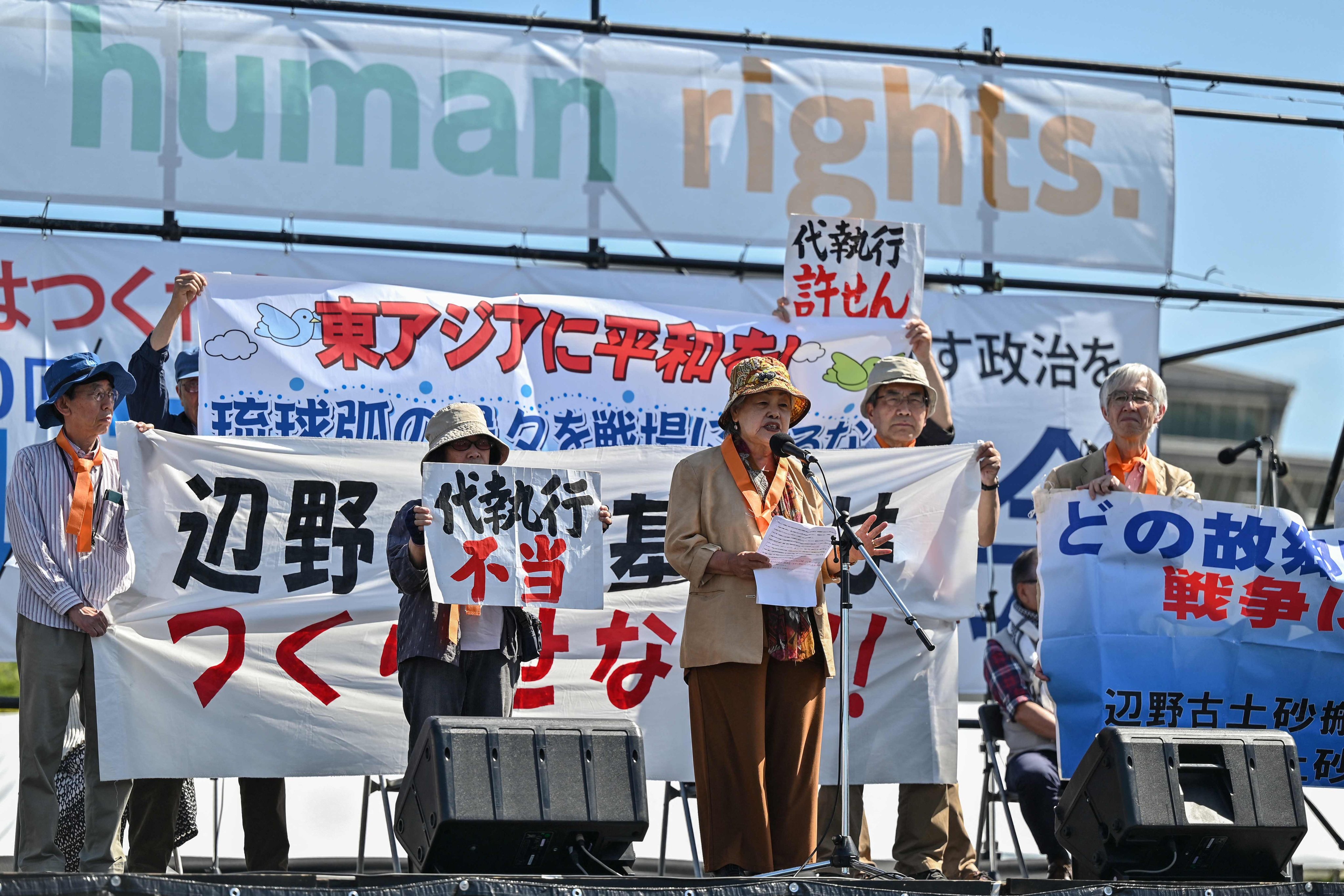 Activists rally against the construction of US military bases in Okinawa, Japan, in May. Photo: AFP