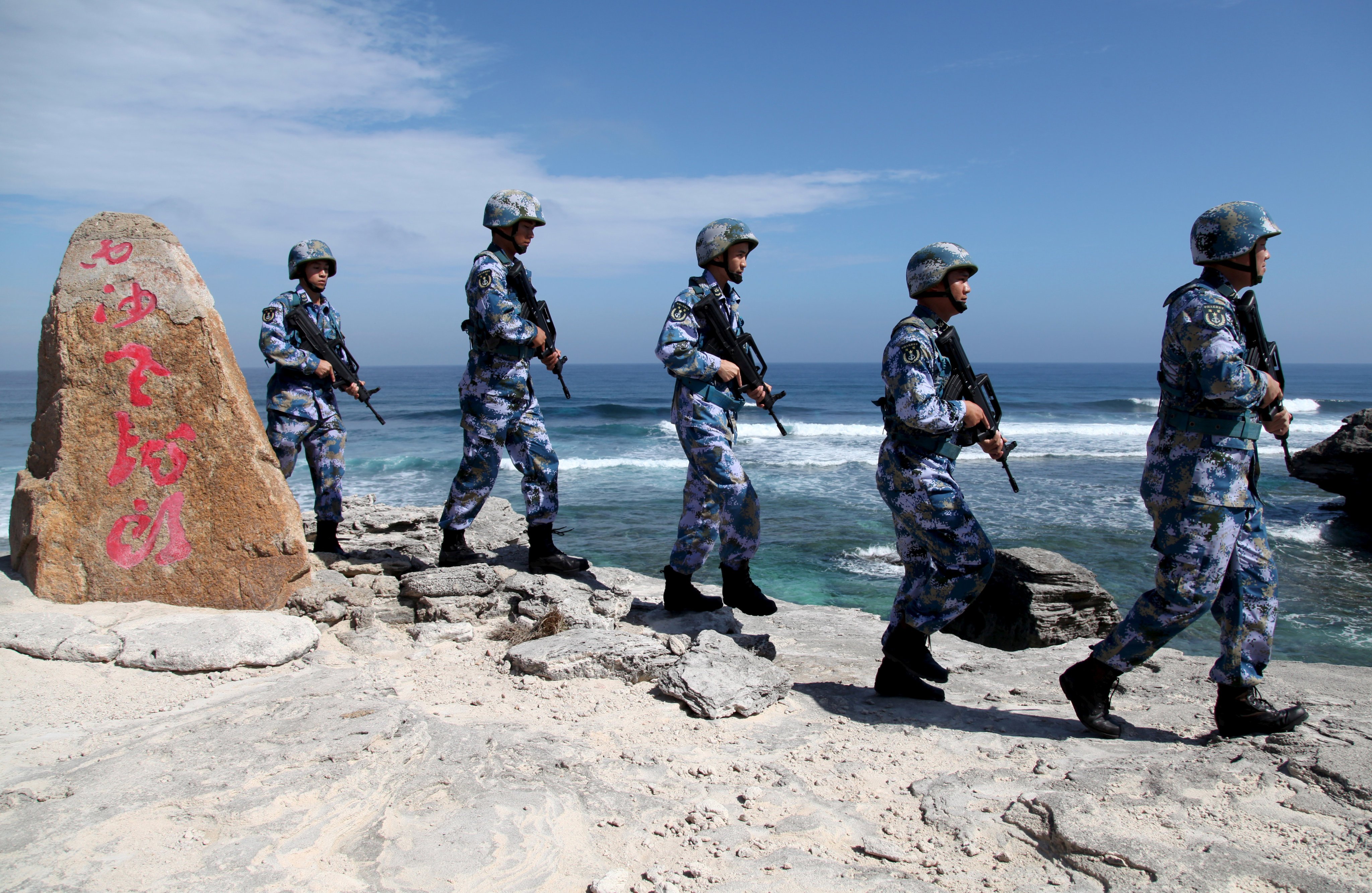 Chinese marines on patrol on Woody Island in the Paracels, which falls under the jurisdiction of the city of Sansha. Photo: Reuters
