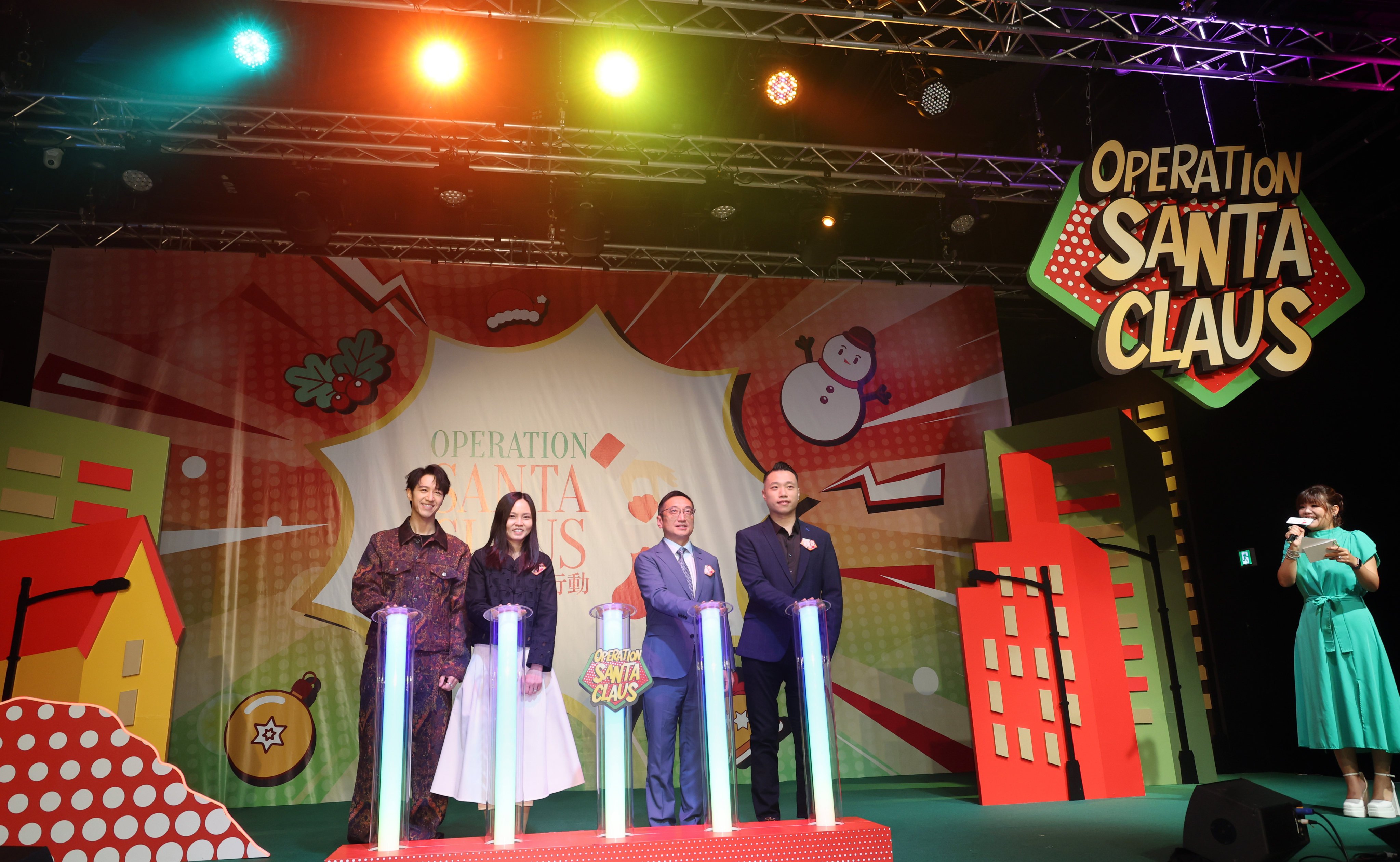 Singer Jay Fung (left), Christine Wai, Paul Wong and Daniel Chan get Operation Santa Claus 2024 under way at Tuesday’s launch ceremony. Photo: Dickson Lee