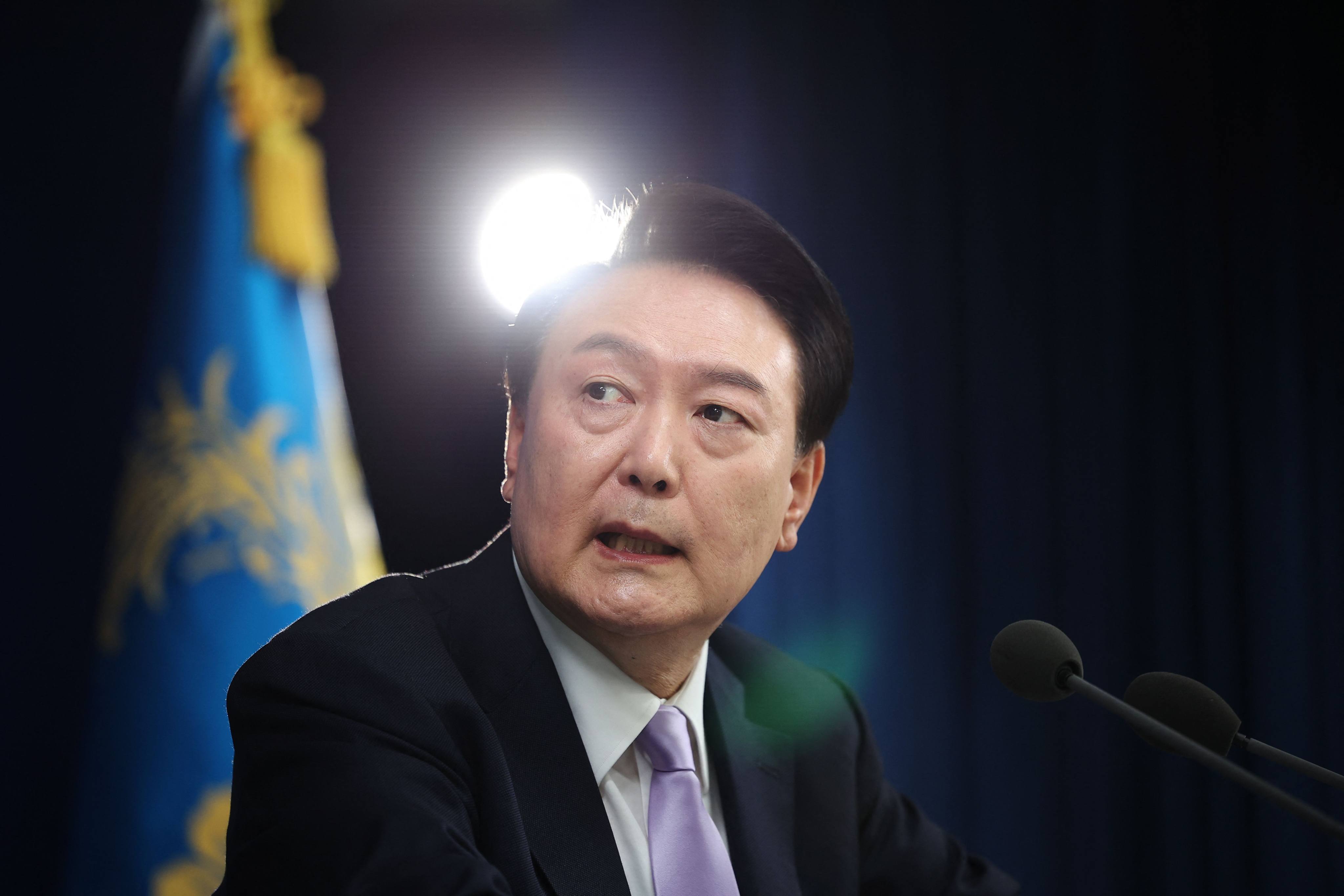 South Korean President Yoon Suk-yeol answers questions during a press conference at the Presidential Office in Seoul on Thursday. Photo: AFP