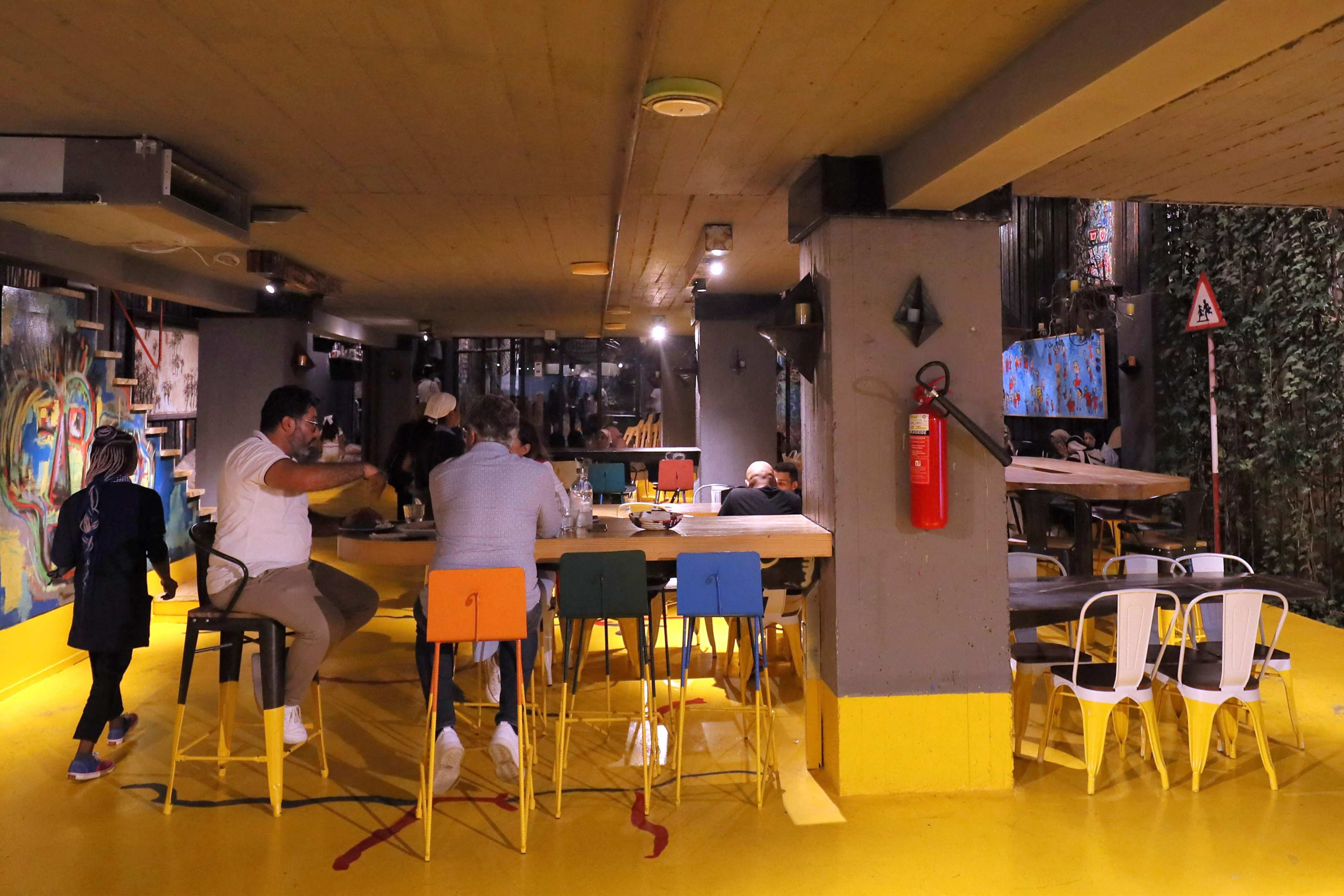 Lamma cafe in Libya, built from recycled materials, serves as a cultural hub and promotes eco-friendly practices in a post-war environment. Photo: AFP