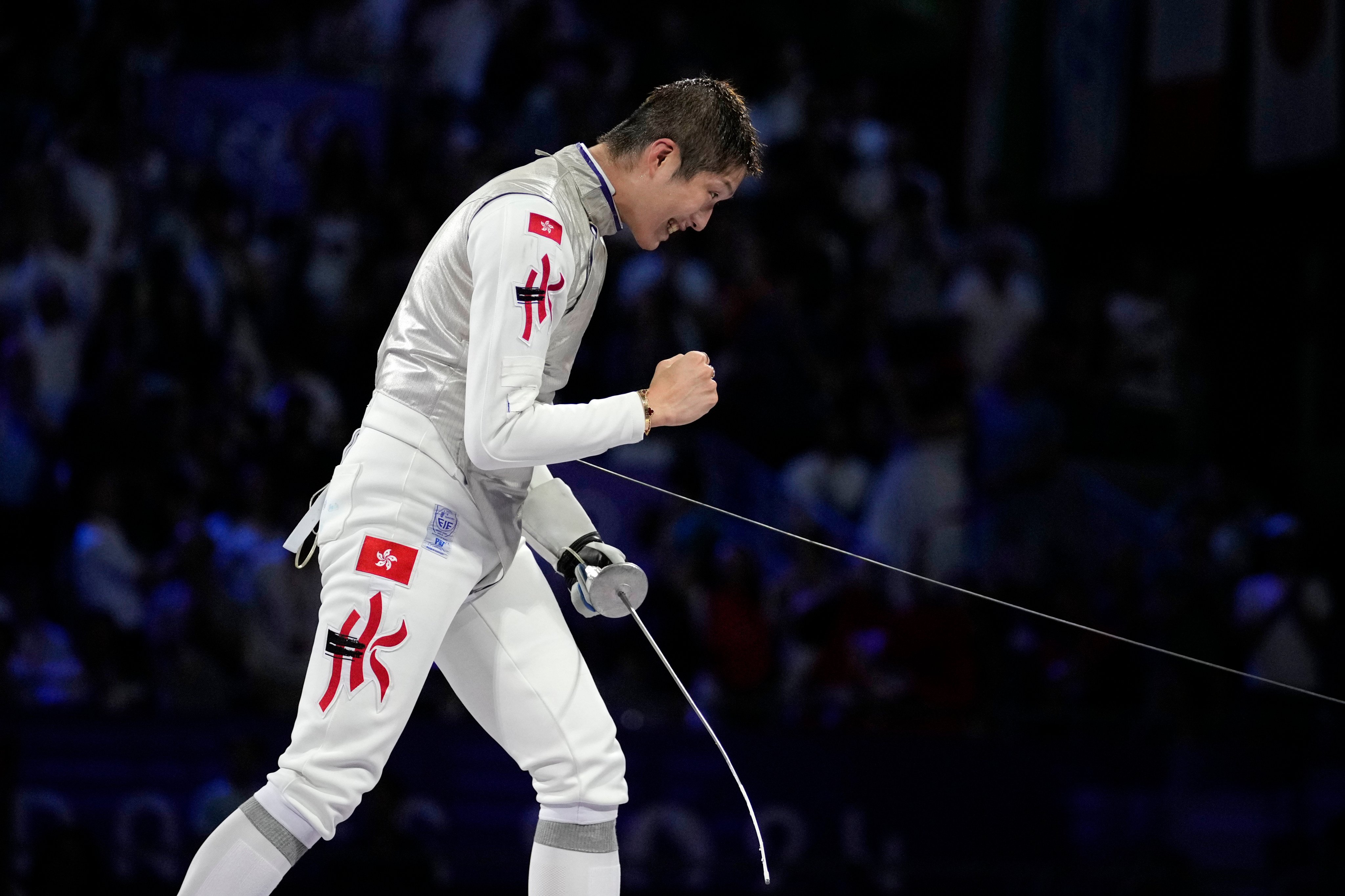 Hong Kong’s Cheung Ka long celebrates after winning the individual foil final against Italy’s Filippo Macchi at the Paris Olympics in July. Photo: AP