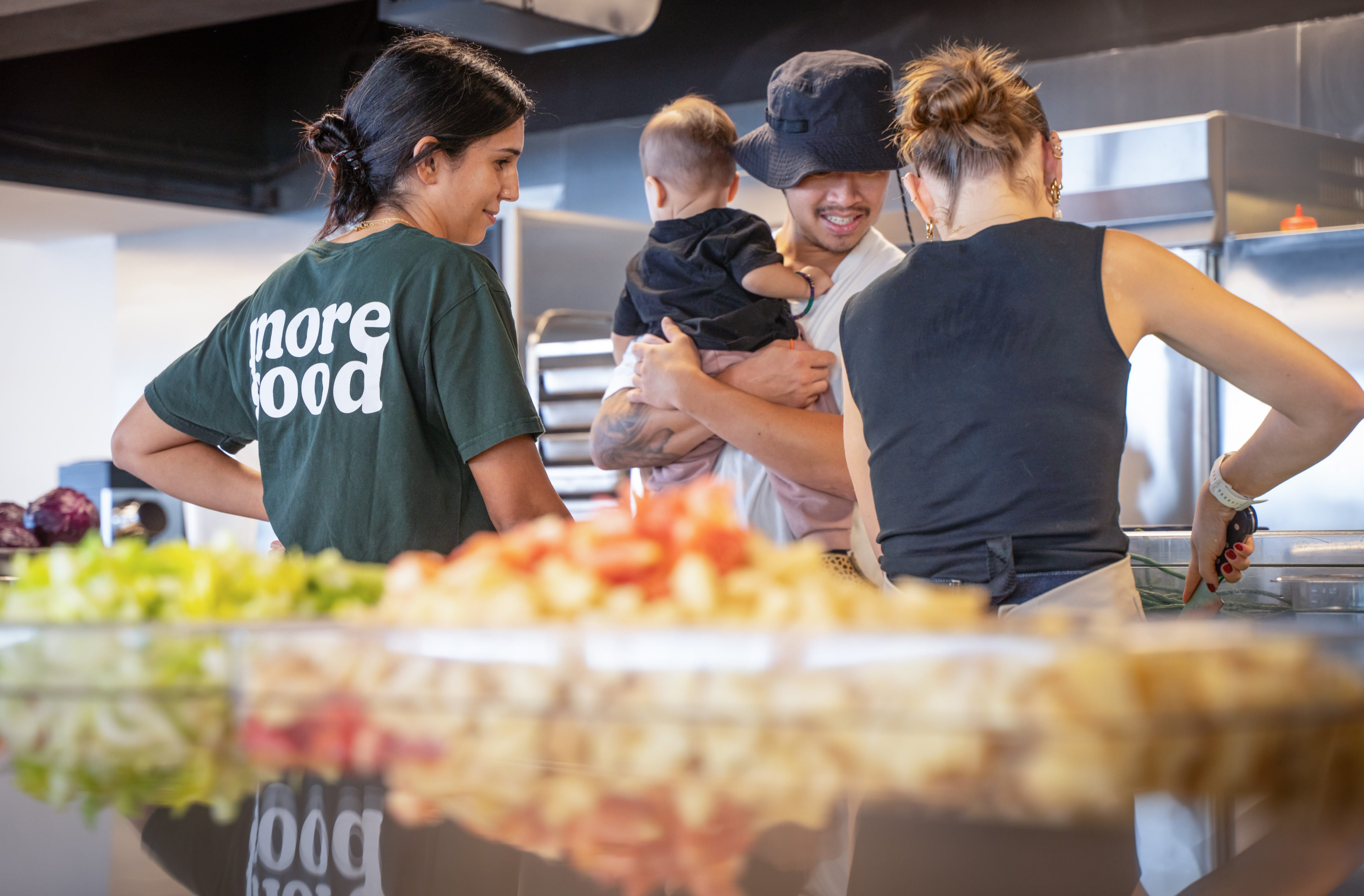 Volunteers bring their kids to the kitchen at More Good in Hong Kong. Photo: Alexander Mak