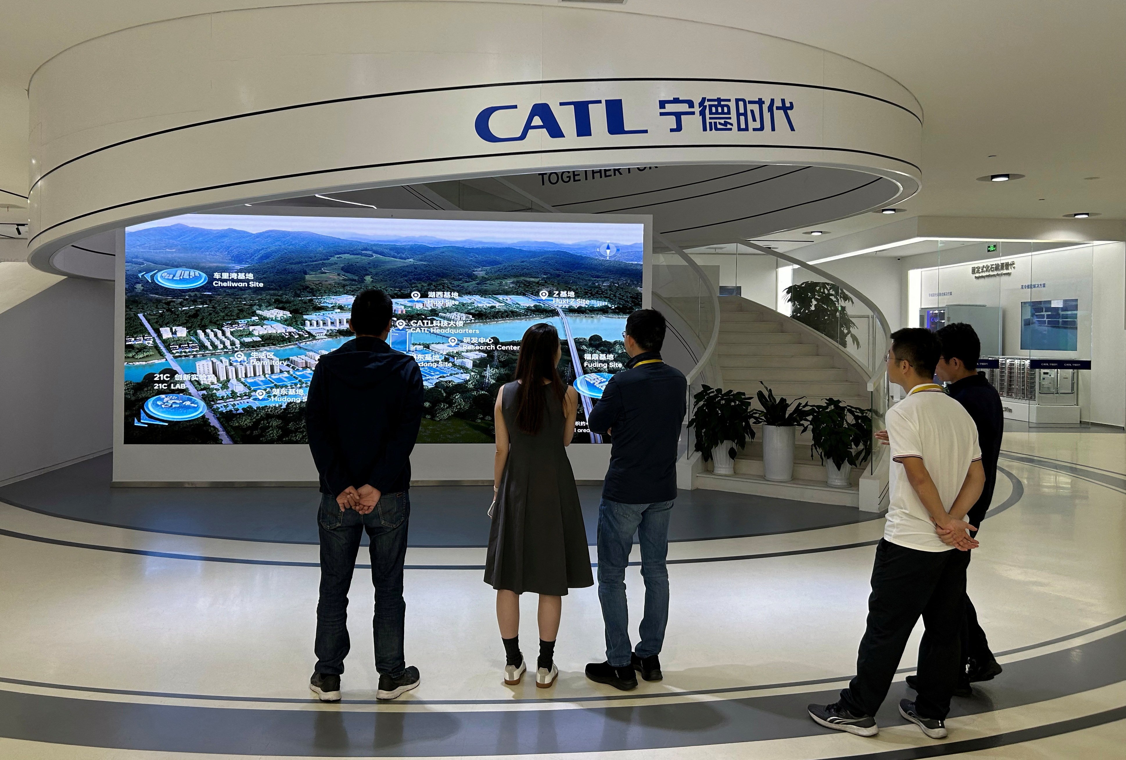 Visitors look at a display of CATL operations at the Chinese battery maker’s headquarters in Ningde, Fujian province, on November 8, 2024. Photo: Reuters