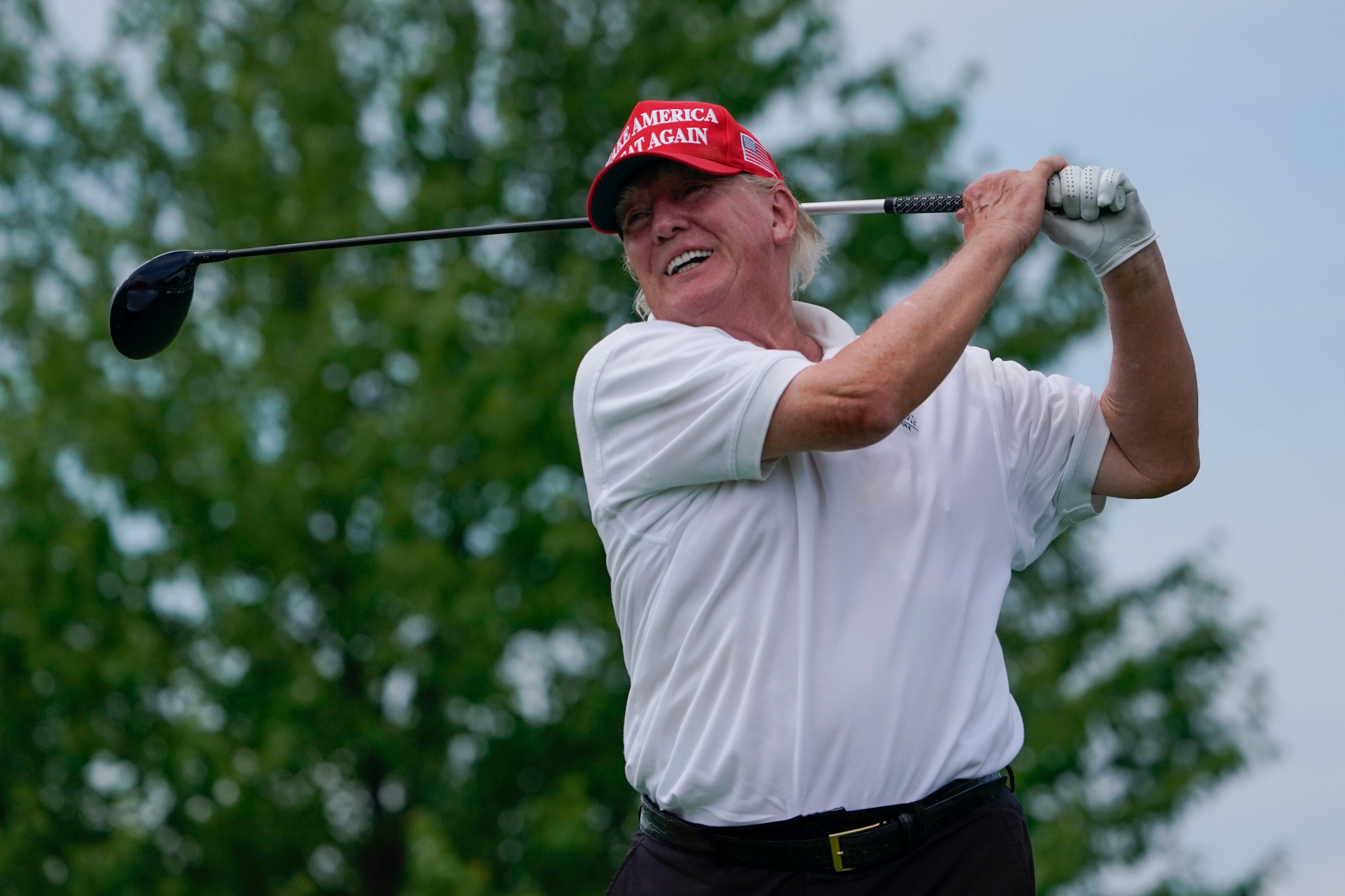 Donald Trump plays golf at a tournament in New Jersey in 2022. Photo: AP