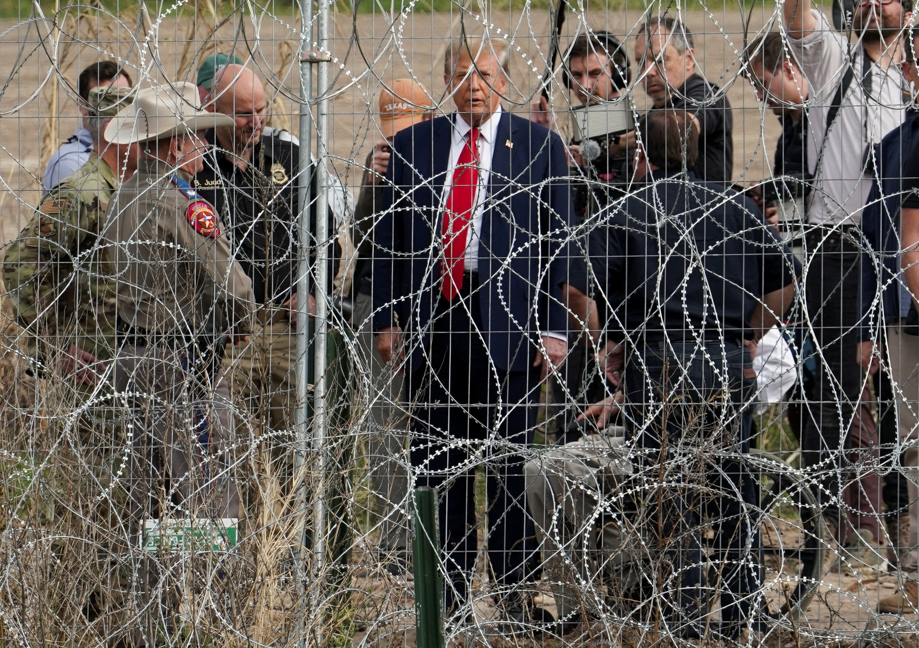 Donald Trump visits the US-Mexico border at Eagle Pass, Texas, in February, when he was running for president. An immigration crackdown is high on his agenda when his new term begins. Photo: Reuters