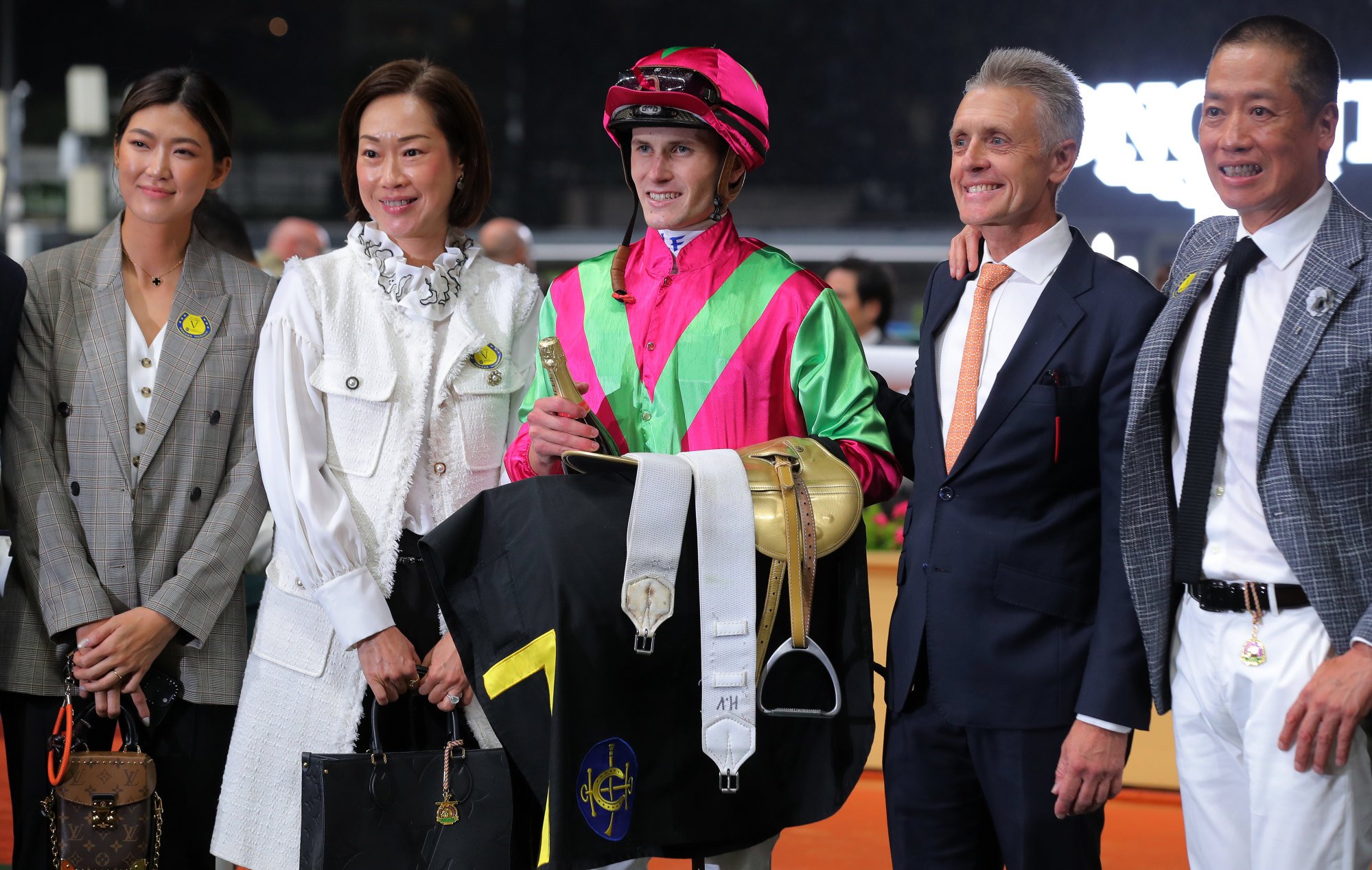 Jockey Luke Ferraris, trainer Mark Newnham (second from right) and connections of Street Conqueror.