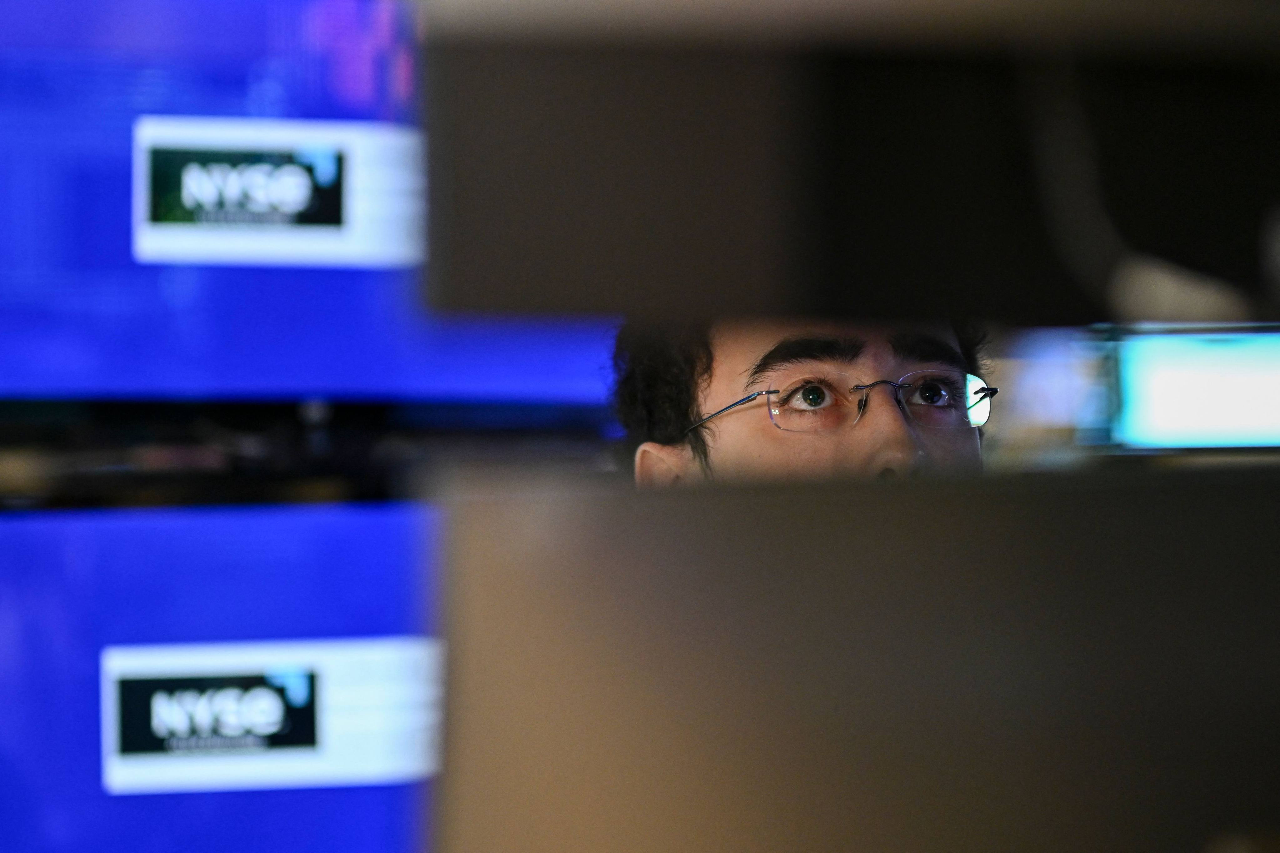 Traders work on the floor of the New York Stock Exchange on November 13, 2024. Photo: AFP