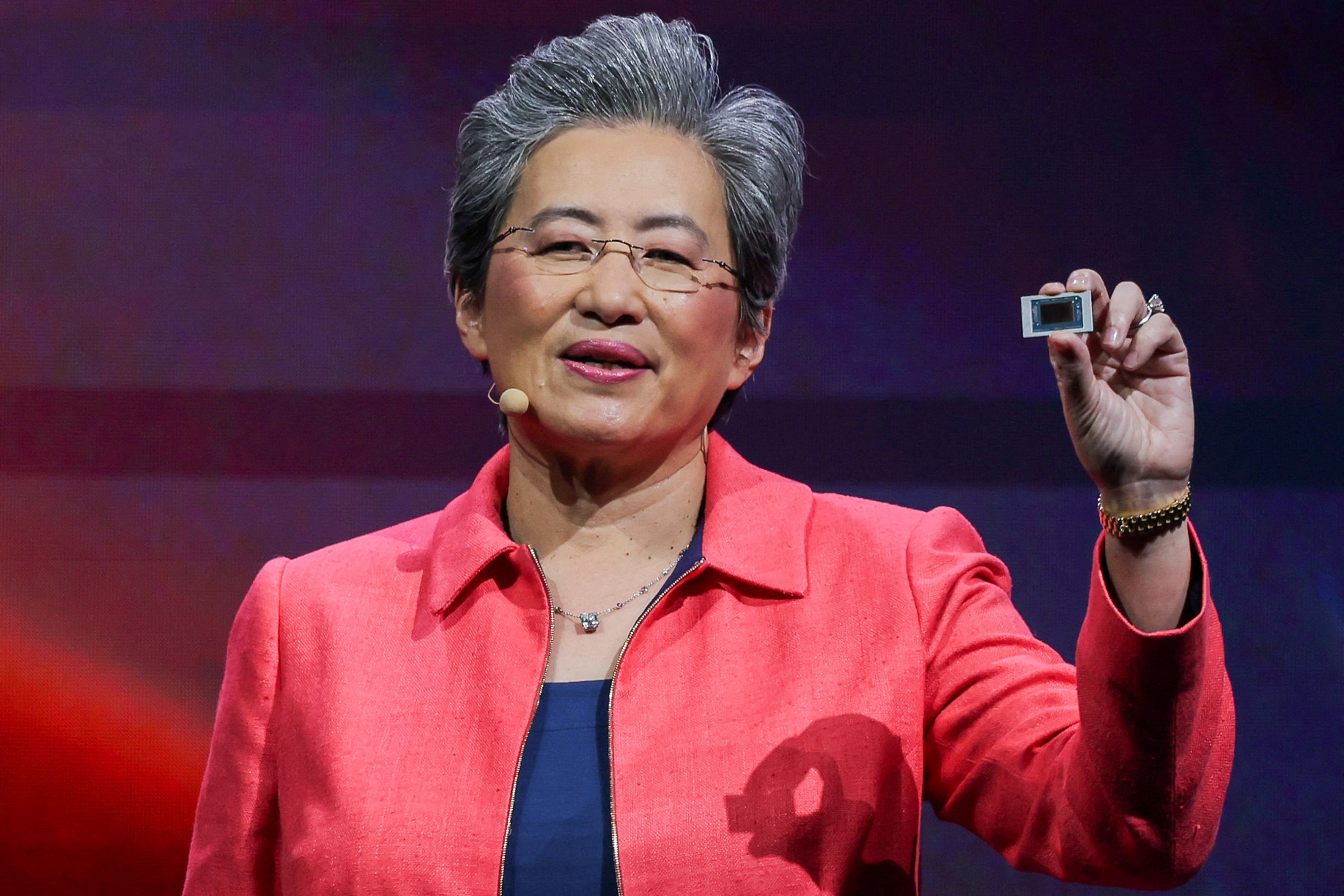 AMD CEO Lisa Su holds a chip at the Computex forum in Taipei in June. Photo: Reuters