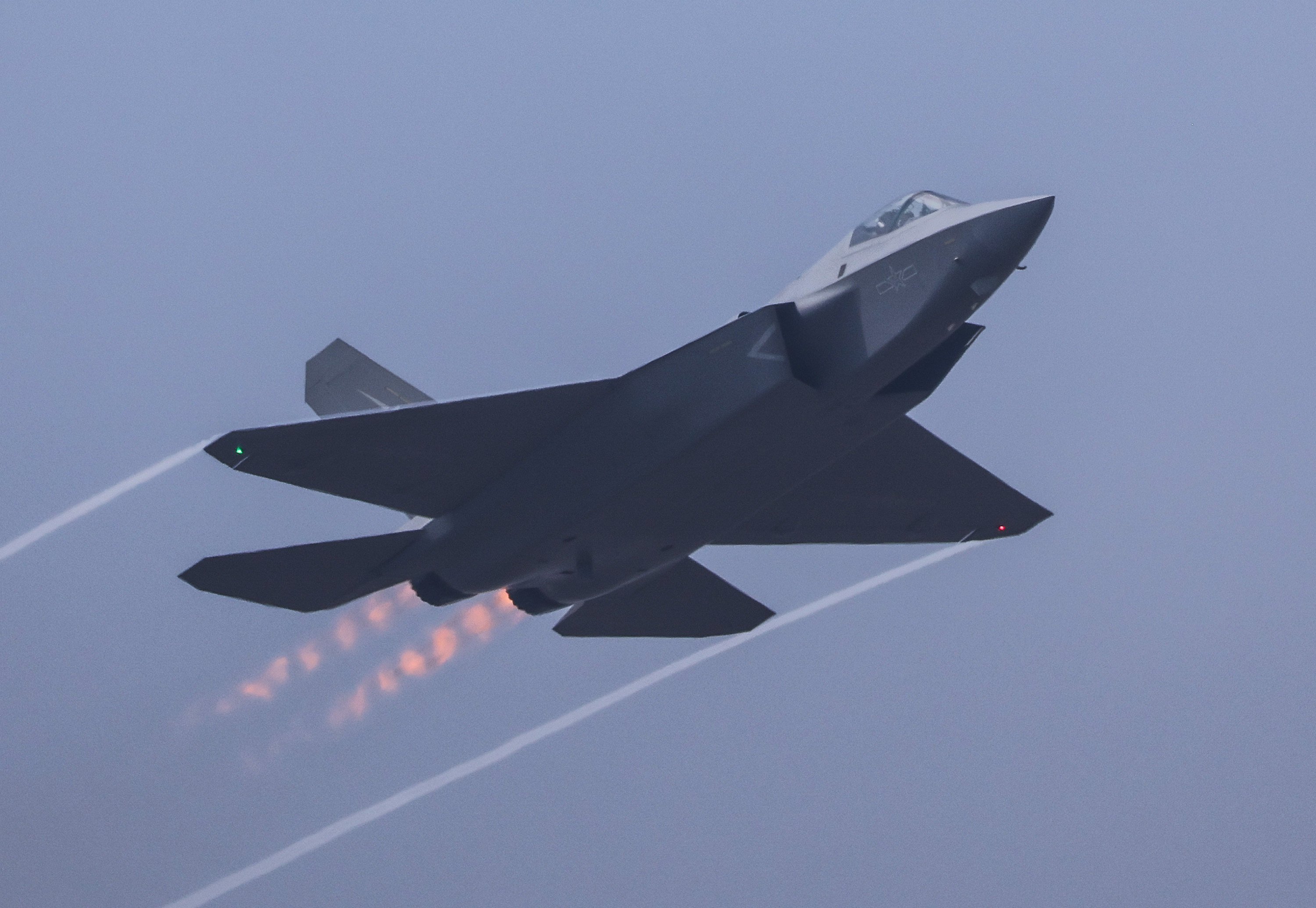 A J-35A stealth fighter is put through its paces during a performance at the Zhuhai Air Show on Tuesday. Photo: Xinhua