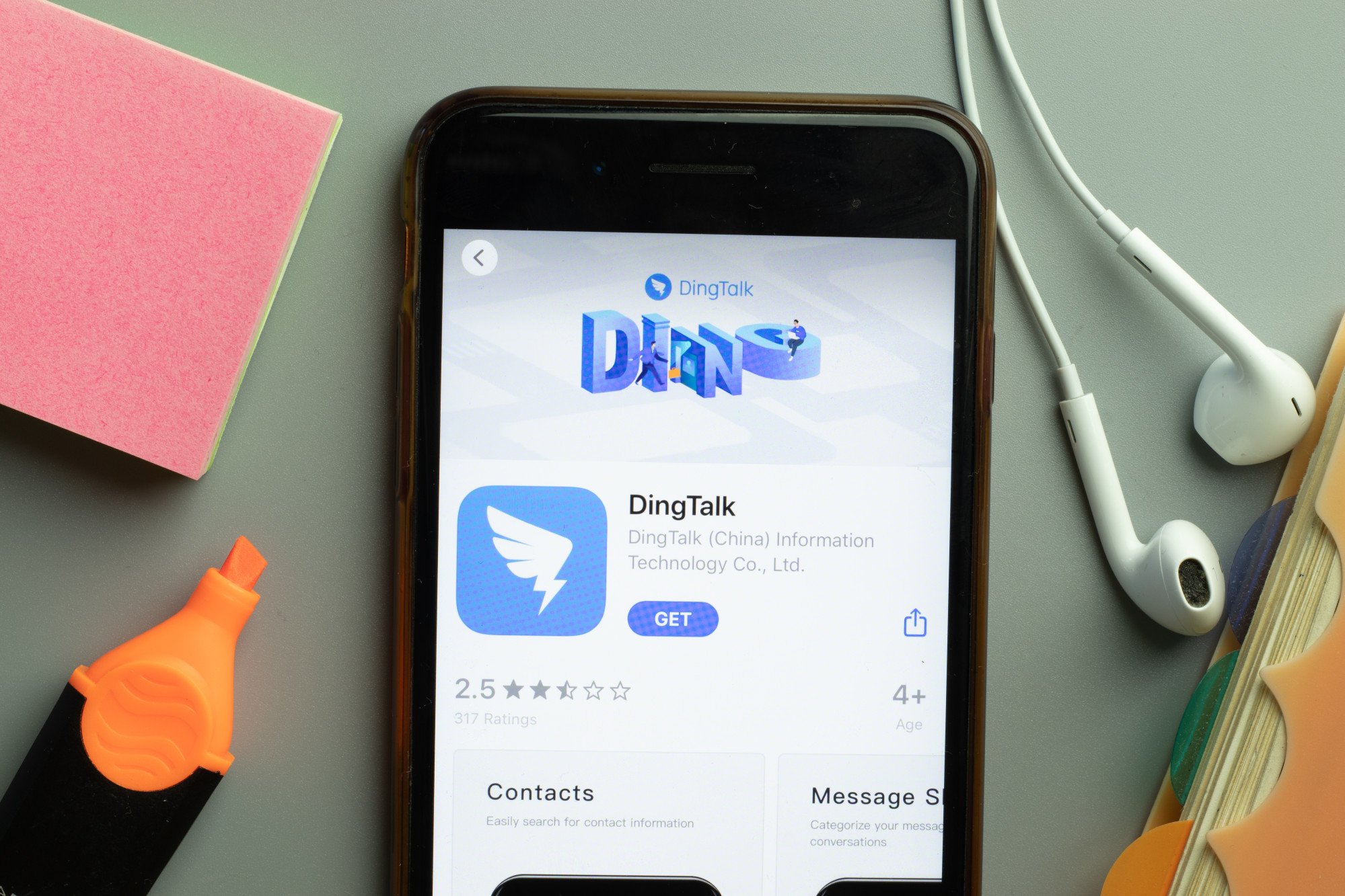 The DingTalk app icon is seen on a smartphone. Photo: Shutterstock Images