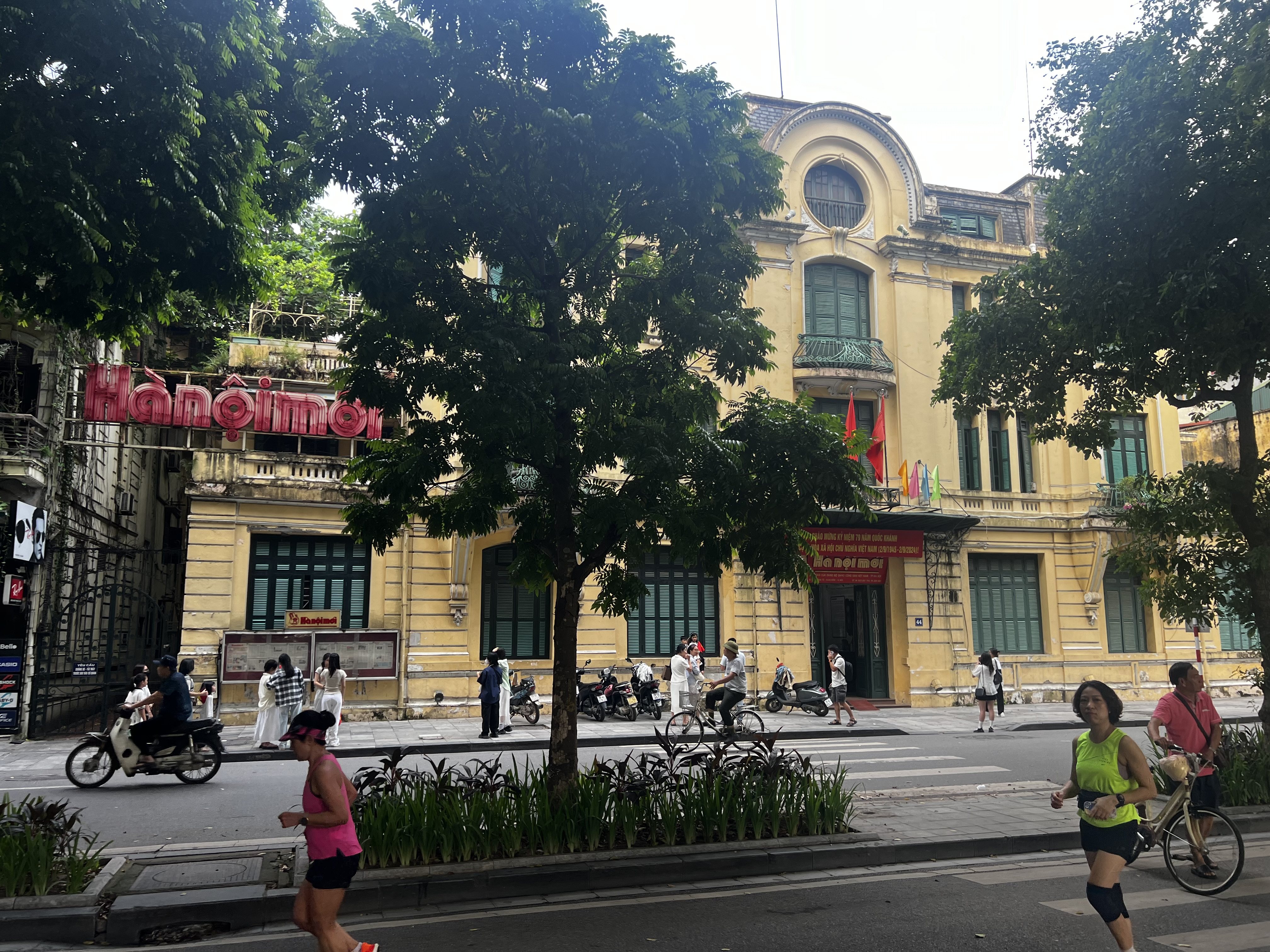 The office building of Hanoi’s first Communist Party newspaper, the Hanoi Moi, is a popular background for Instagram photos. 
The capital city is a symbol of Vietnam’s resilience after centuries of war and colonialism. Photo: Erika Na