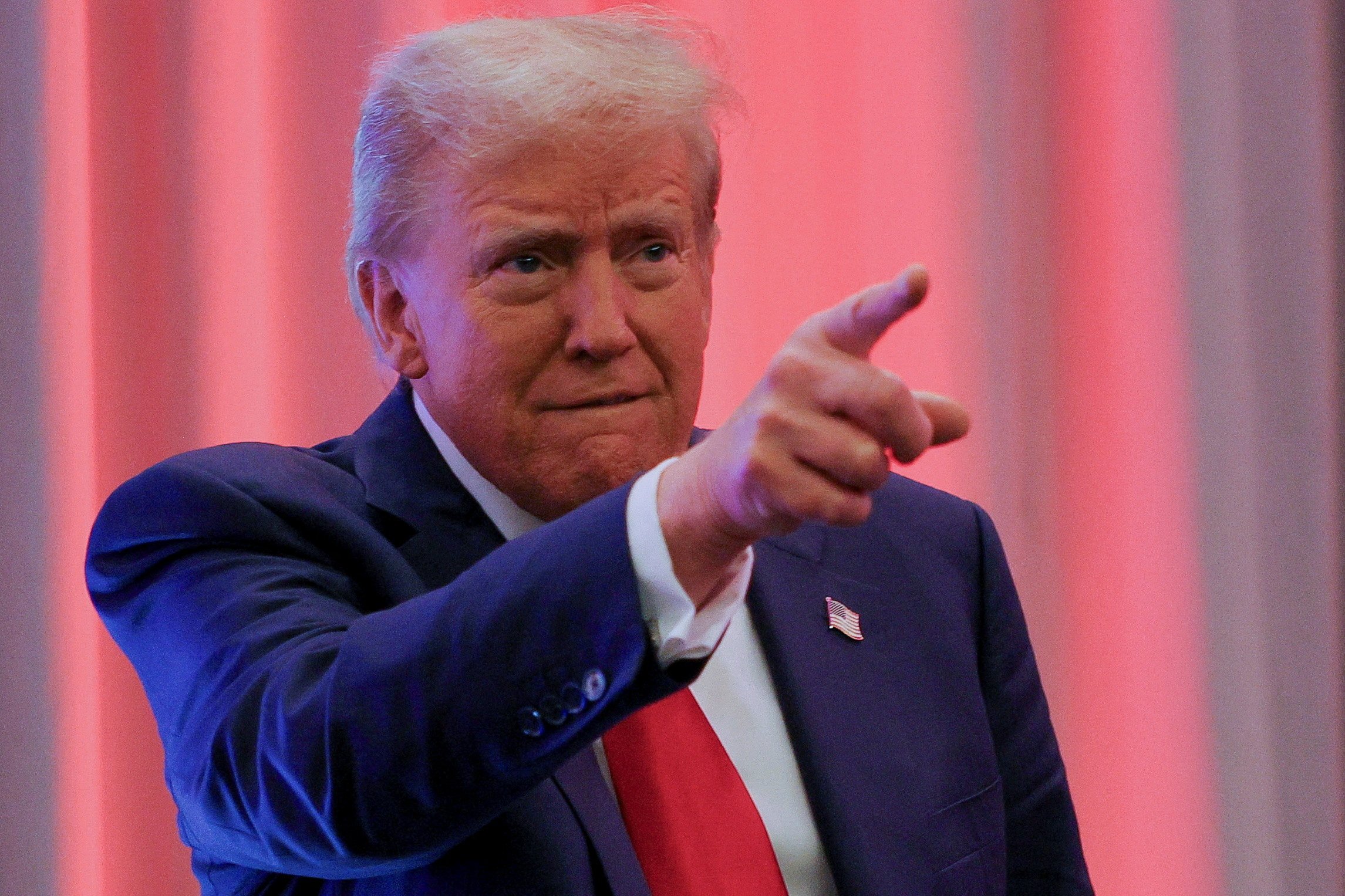 Donald Trump gestures as he meets House Republicans in Washington on November 13. Photo: Reuters