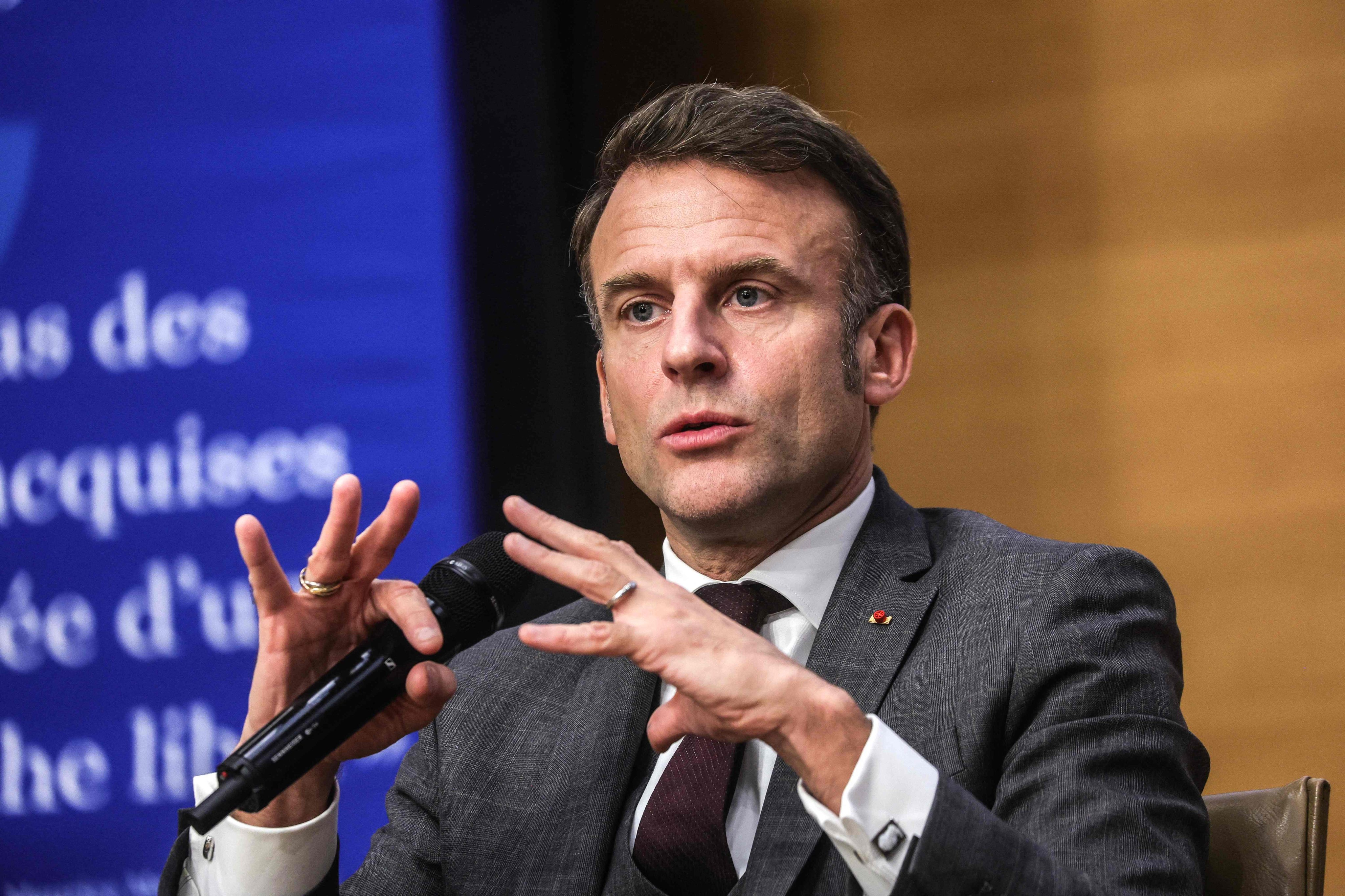 French President Emmanuel Macron speaks during a round table discussion in Paris on Wednesday. Photo: AFP