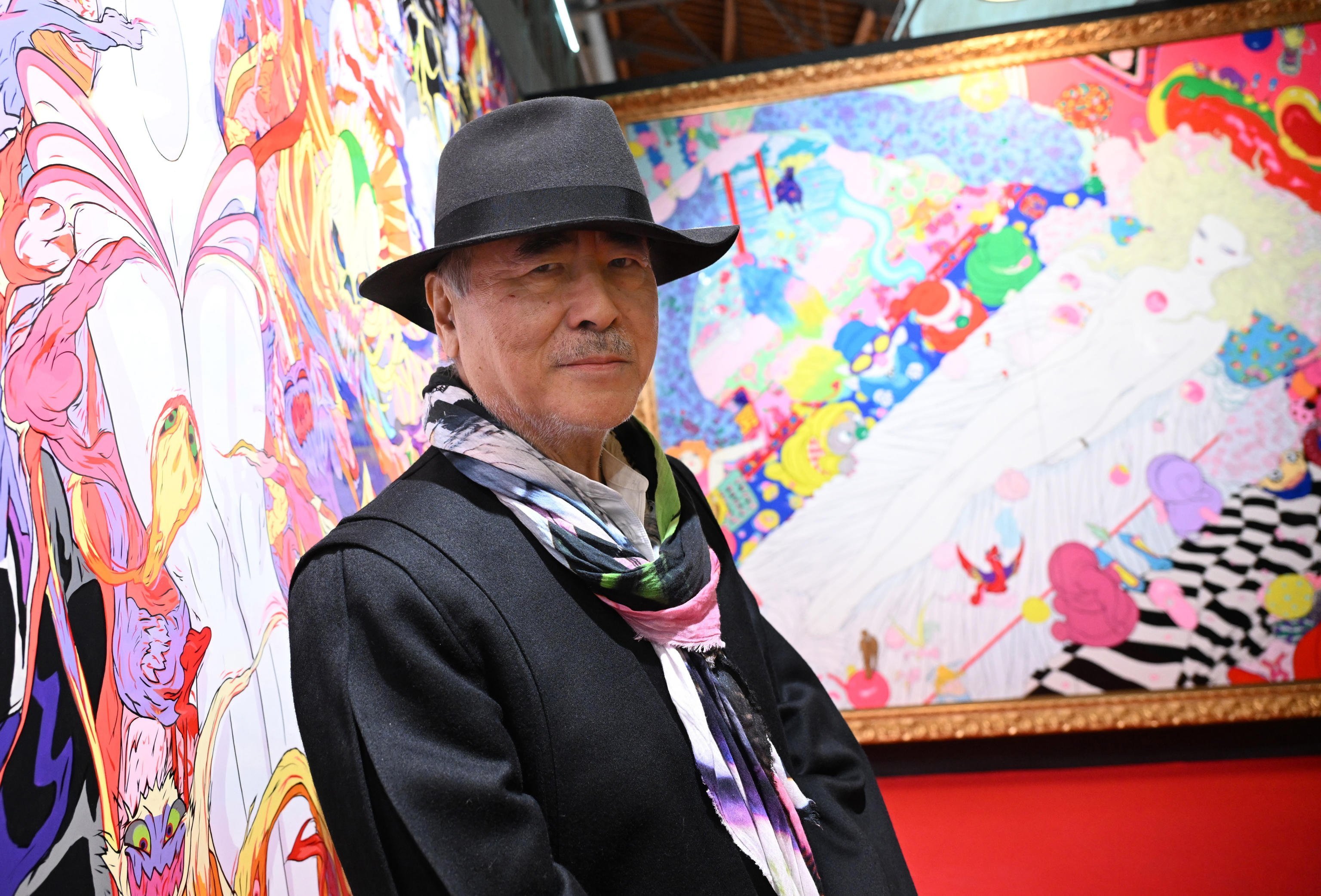 Yoshitaka Amano at his exhibition “Amano Corpus Animae”, in Milan, Italy. The Japanese artist’s style, influenced by everything from Western pop art to manga, is said to be immediately recognisable. Photo: EPA-EFE