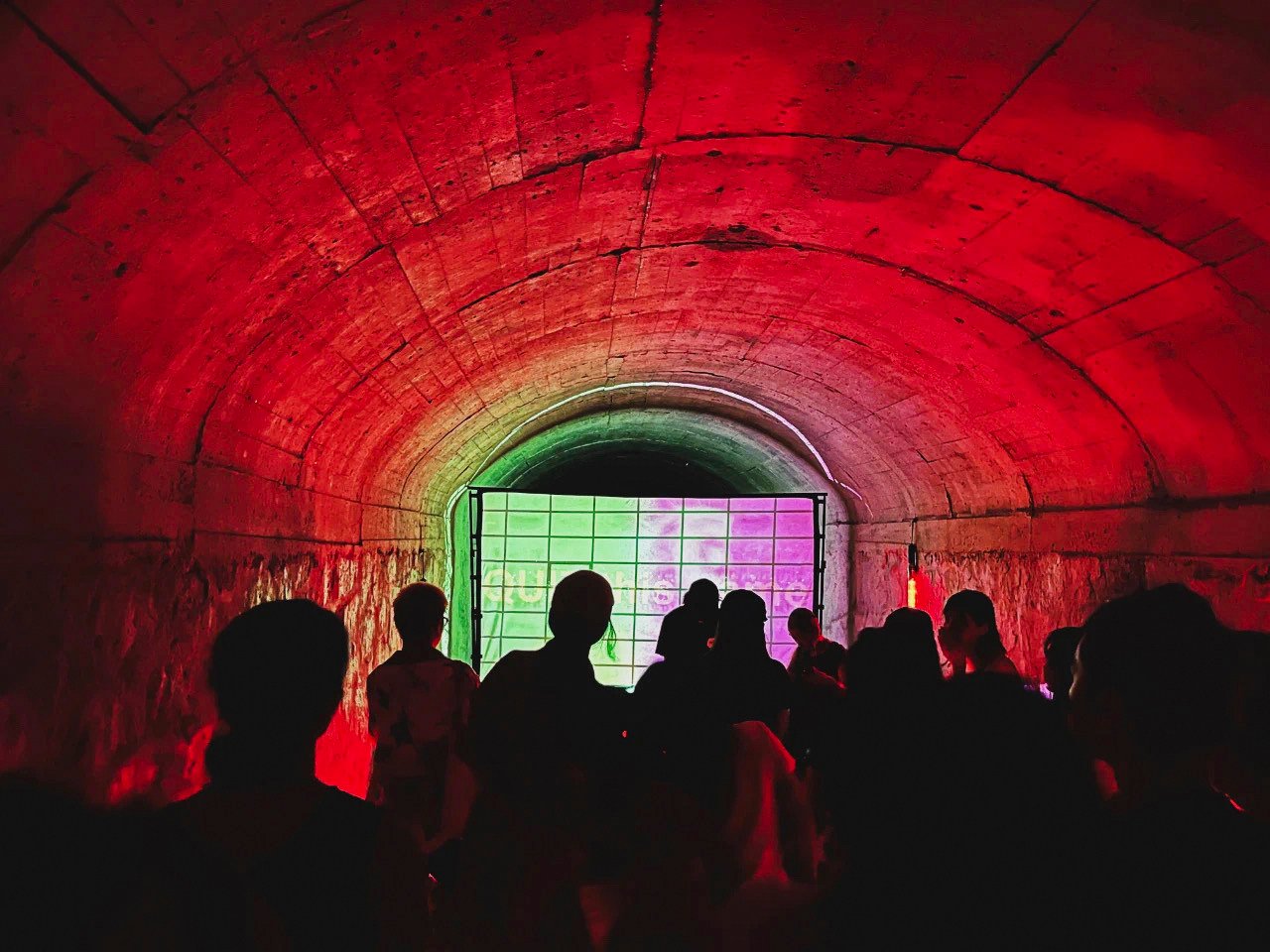 Ravers dance in an abandoned air raid shelter in Guangzhou, China. Underground raves are growing in popularity in the country. Photo: AP