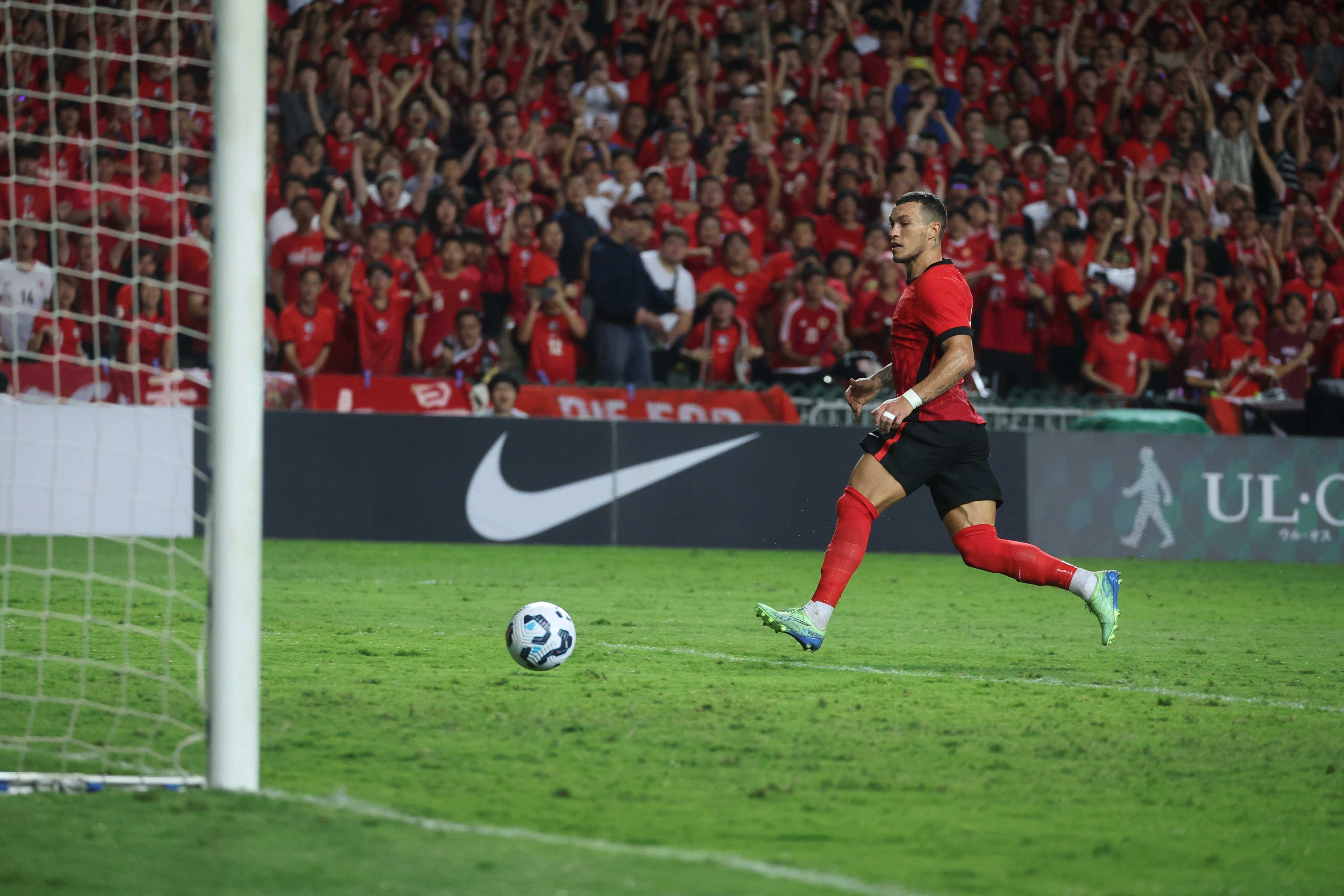 Everton Camargo rolls home Hong Kong’s second goal against the Philippines. Photo: Edmond So