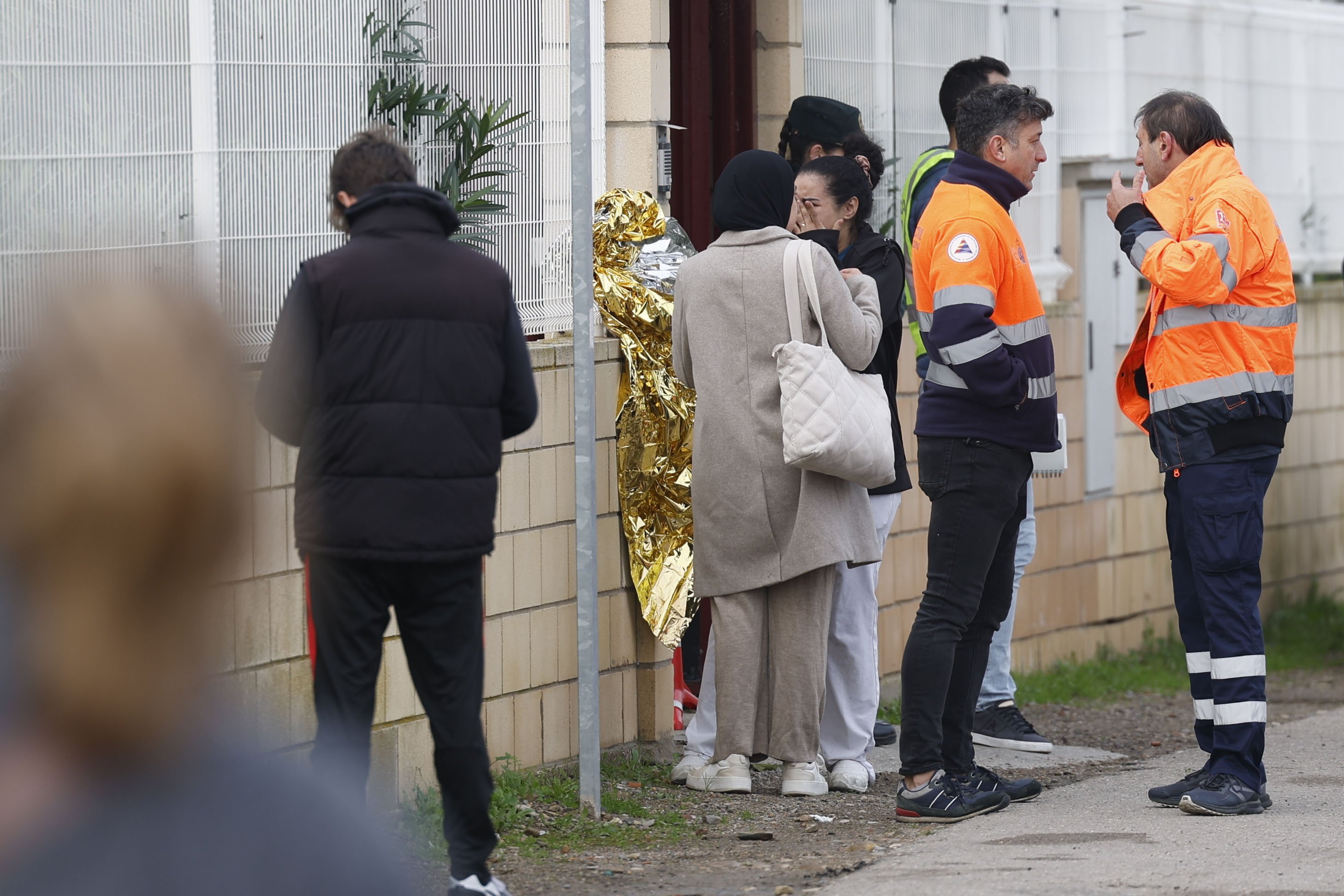 Members of the emergency services and relatives gather outside a retirement home which caught fire in Villafranca de Ebro in Spain. Photo: EPA-EFE