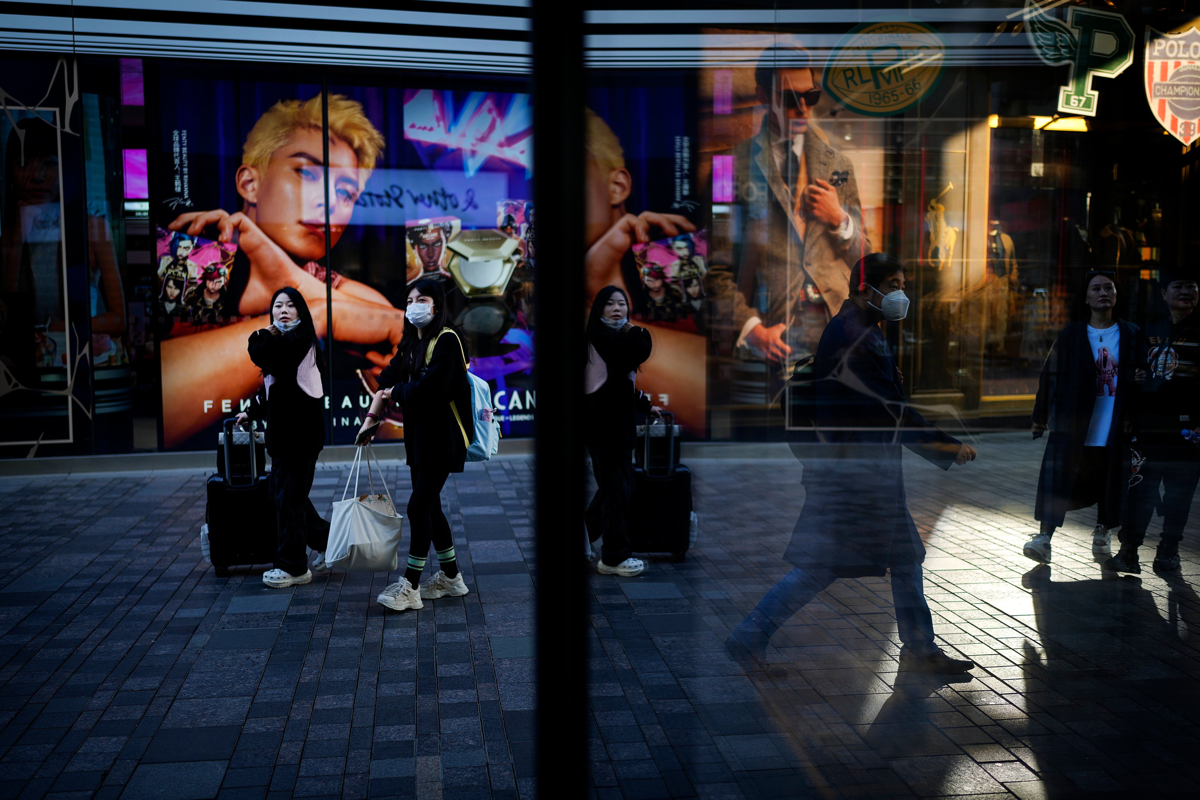 People walk in a popular outdoor shopping mall in Beijing on November 14, 2024. Photo: AP