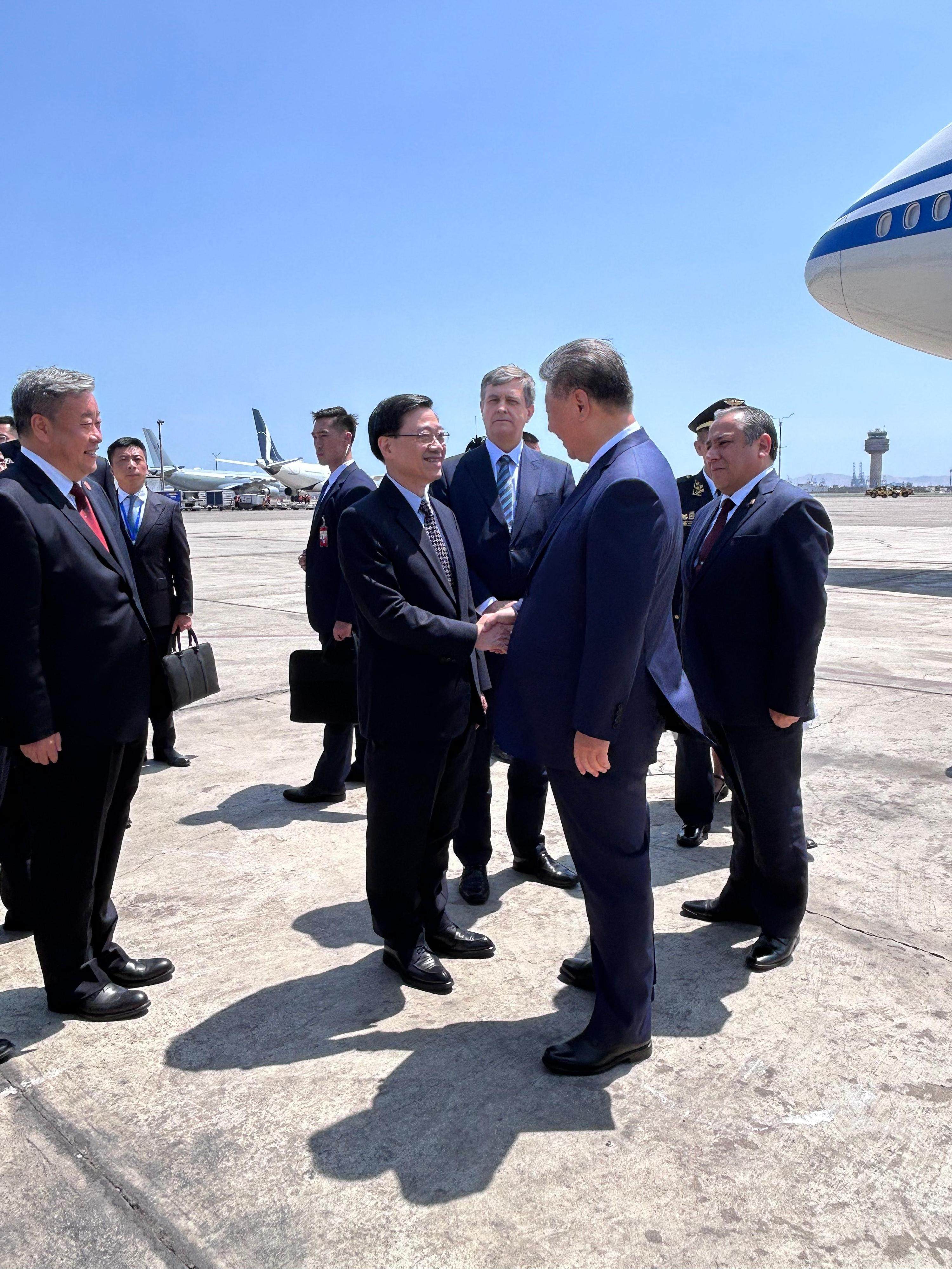 Hong Kong leader John Lee (second left) greets Chinese President Xi Jinping (second right) in Lima, Peru, on Thursday. Photo: ISD