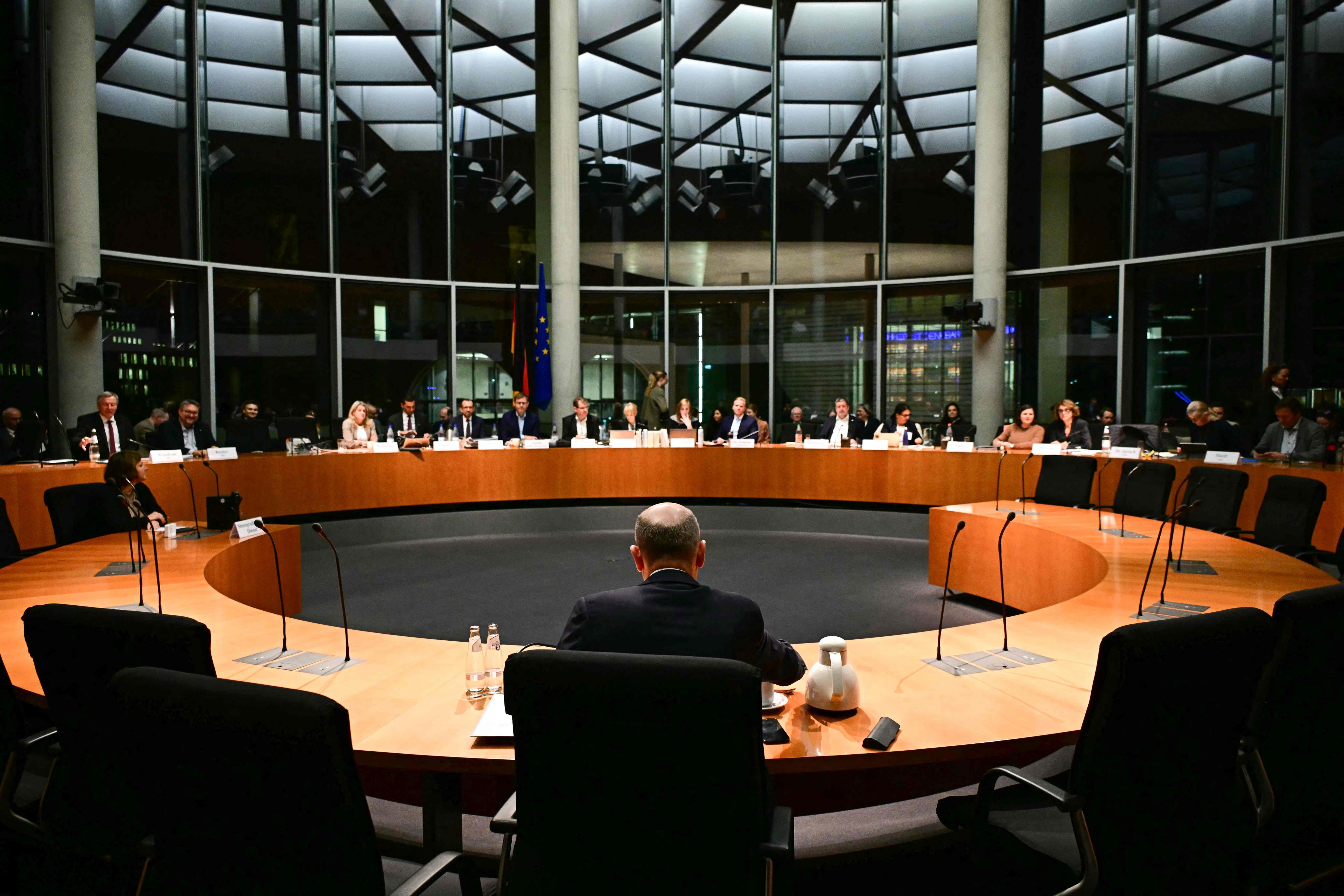 German Chancellor Olaf Scholz (front centre) is pictured ahead of testifying before a committee at the Bundestag in Berlin on November 14. Photo: AFP