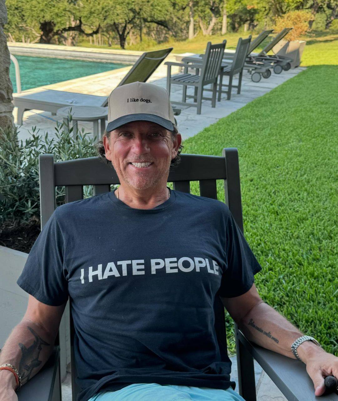 Colourful Texan lawyer Tony Buzbee, wearing an “I like dogs” baseball cap and an “I hate people” T-shirt. Photo: @tonybuzbee/Instagram 