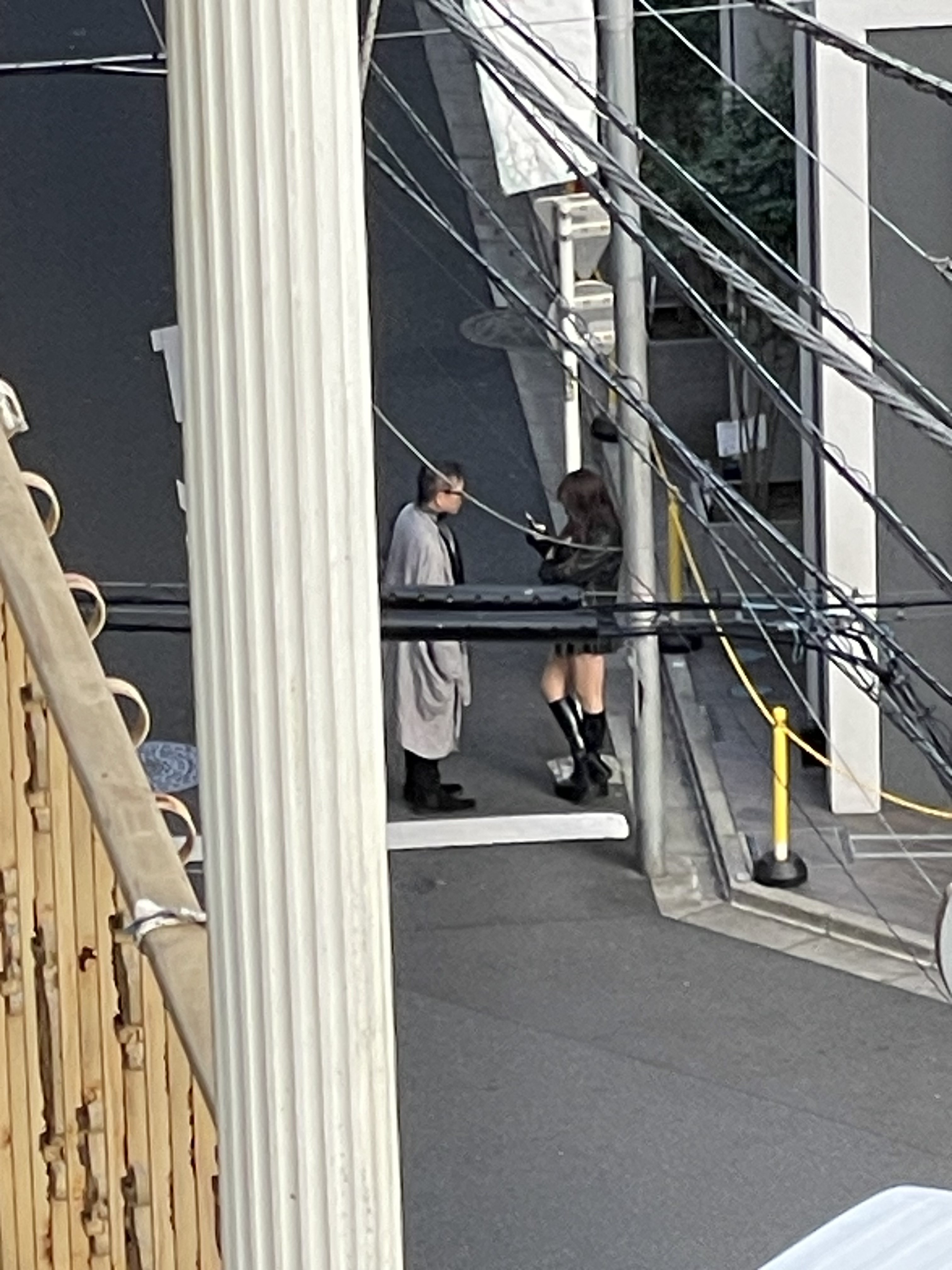 An older man approaches a woman near Okubo Park in Tokyo’s notorious Kabukicho district. Photo: Eric Fior