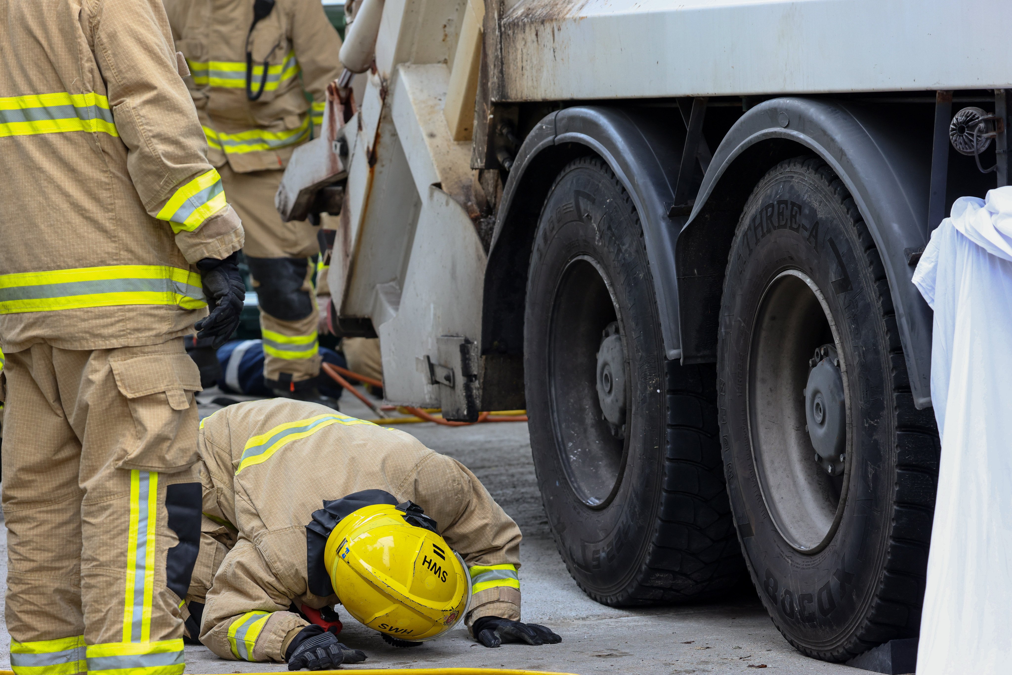 Firefighters respond to the accident in Siu Sai Wan on Saturday. Photo: Dickson Lee