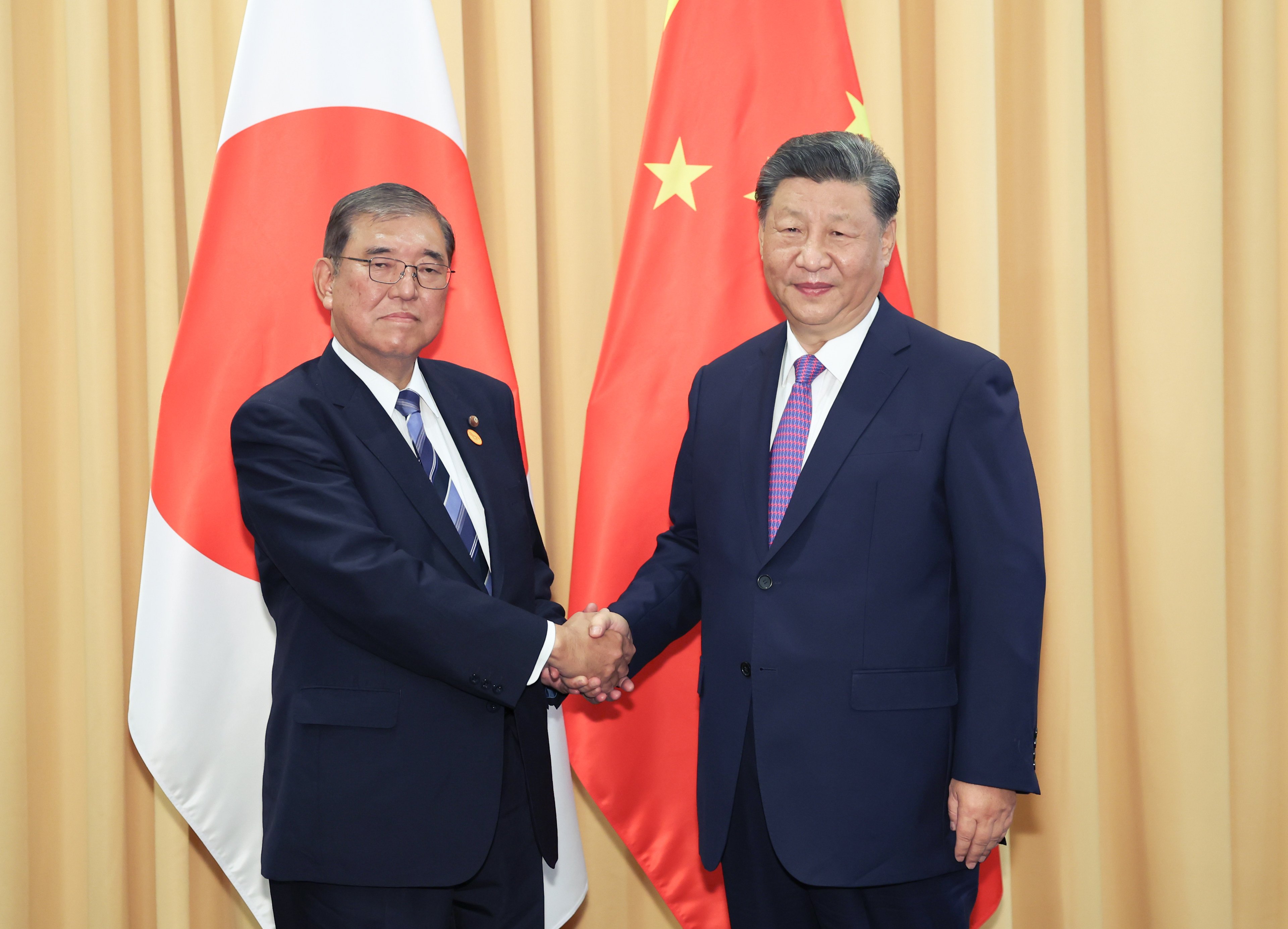 Chinese President Xi Jinping with Japanese Prime Minister Shigeru Ishiba on the sidelines of the 31st Apec Economic Leaders’ Meeting in Lima, Peru, on Friday. Photo: Xinhua