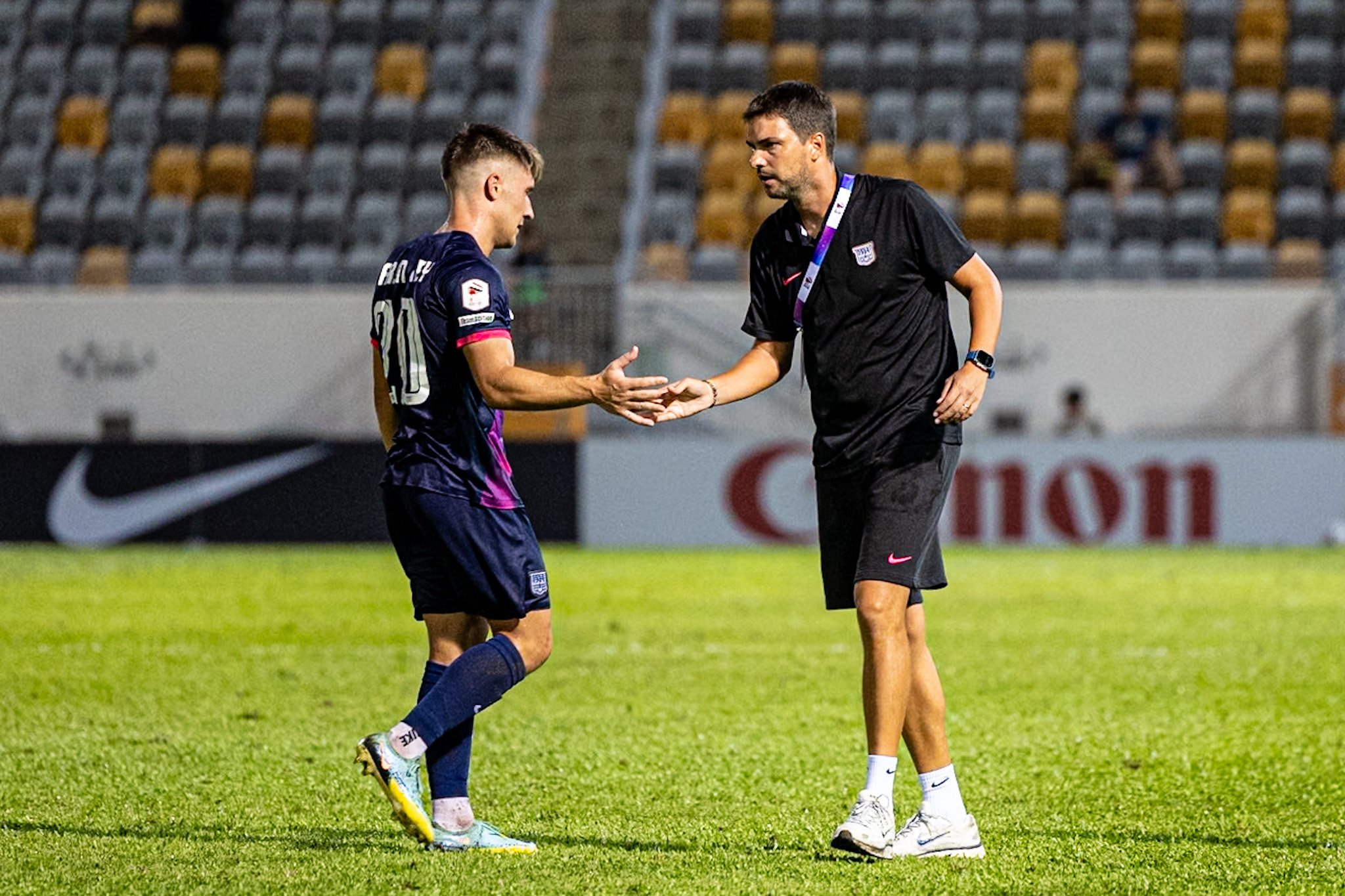 Kitchee boss Edgar Cardoso with midfielder Aaron Rey after a match at Mong Kok Stadium. Photo: Kitchee SC