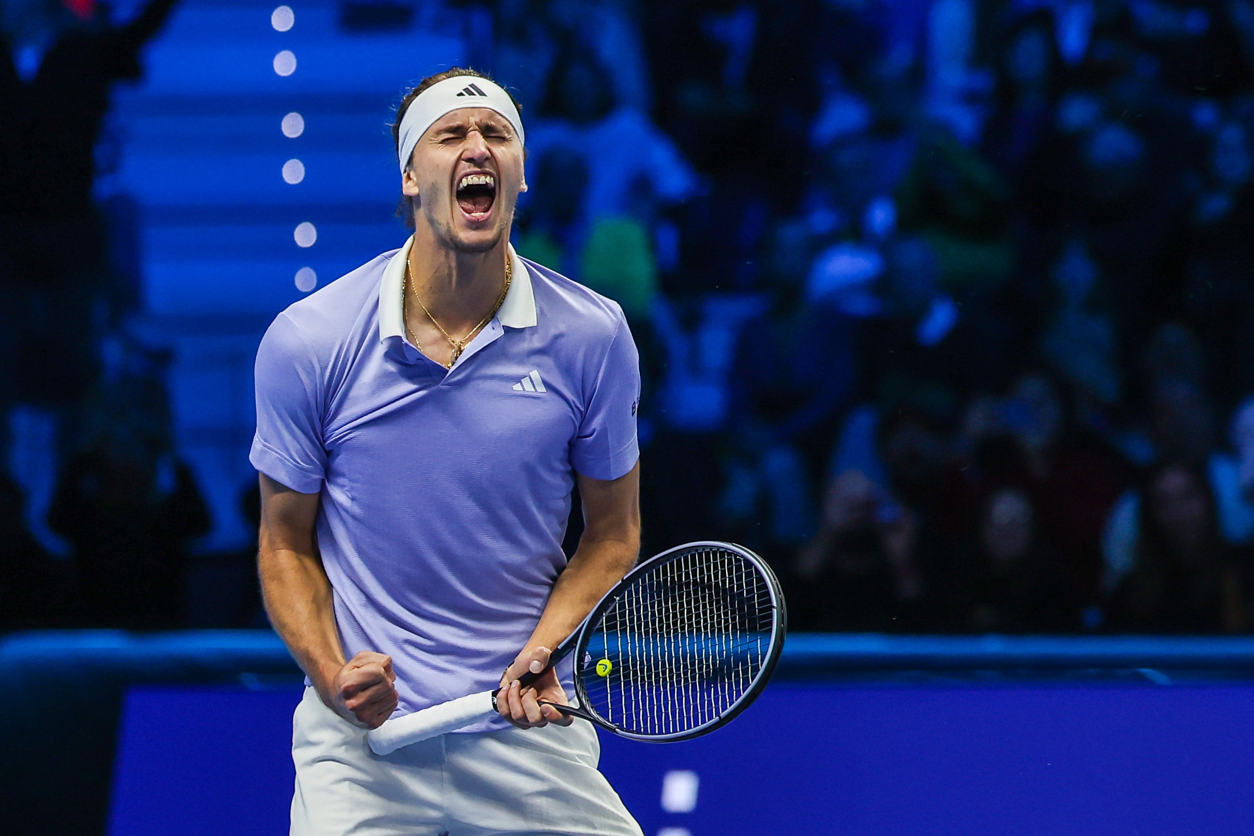 Alexander Zverev celebrates after securing victory against four-time grand slam champion Carlos Alcaraz at the ATP World Tour Finals group stage. Photo: dpa