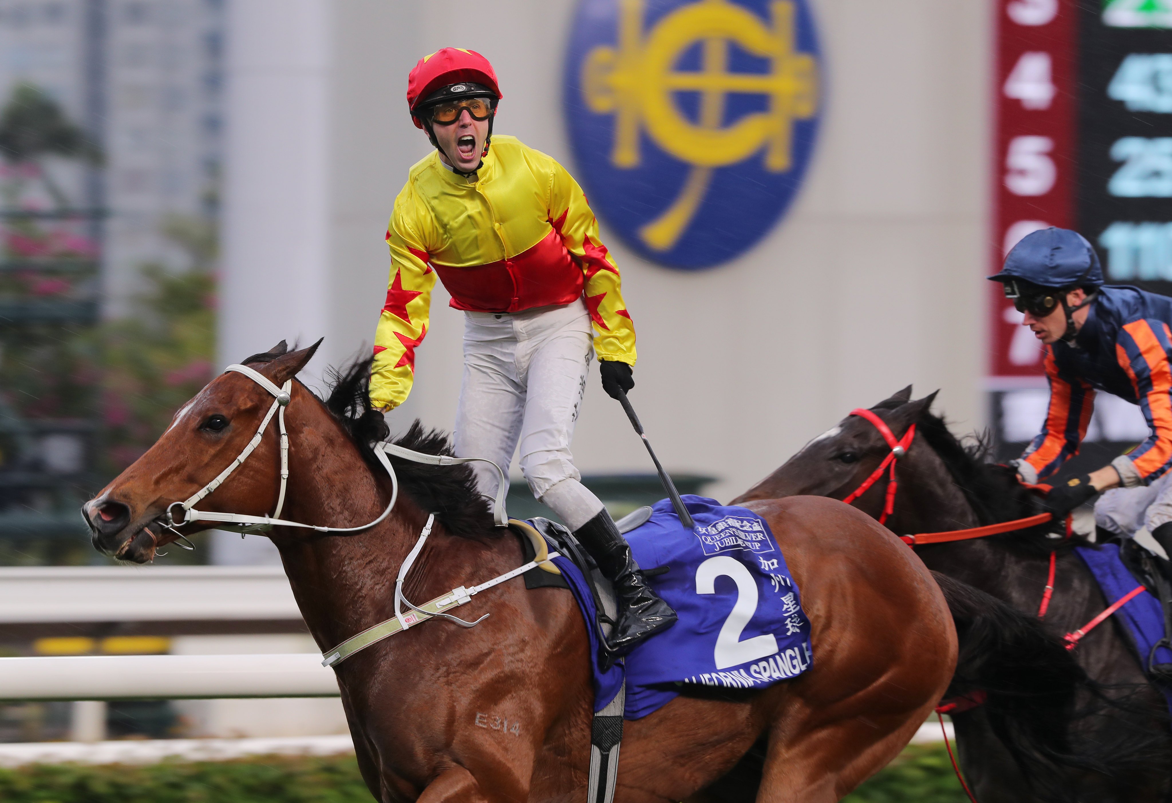 Brenton Avdulla celebrates his Group One Queen’s Silver Jubilee Cup win aboard California Spangle. Photos: Kenneth Chan