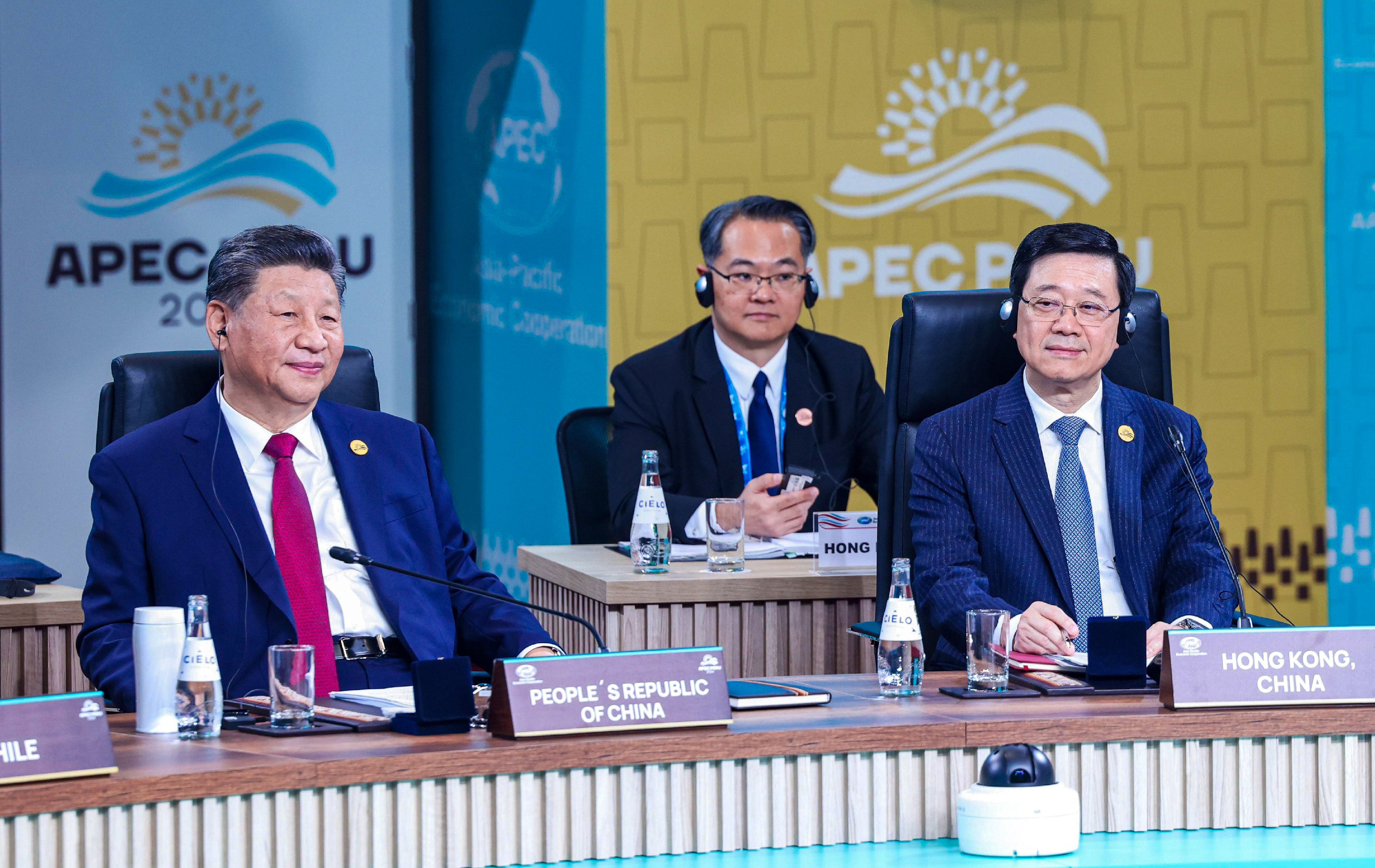 Chinese President Xi Jinping (left) and Hong Kong leader John Lee (right) attend a meeting at this year’s Apec summit in Lima. Photo: Handout