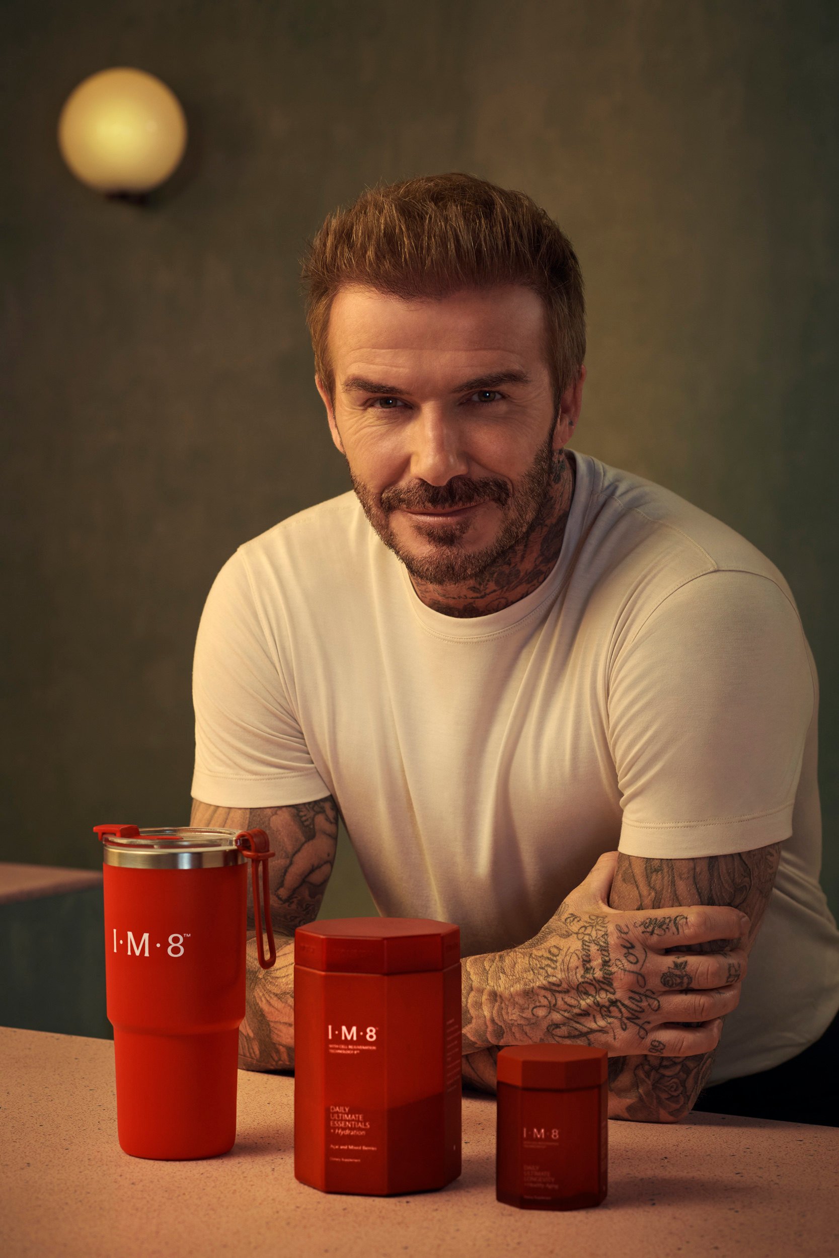 David Beckham with new products under the new health and wellness brand IM8. Photo: Prenetics