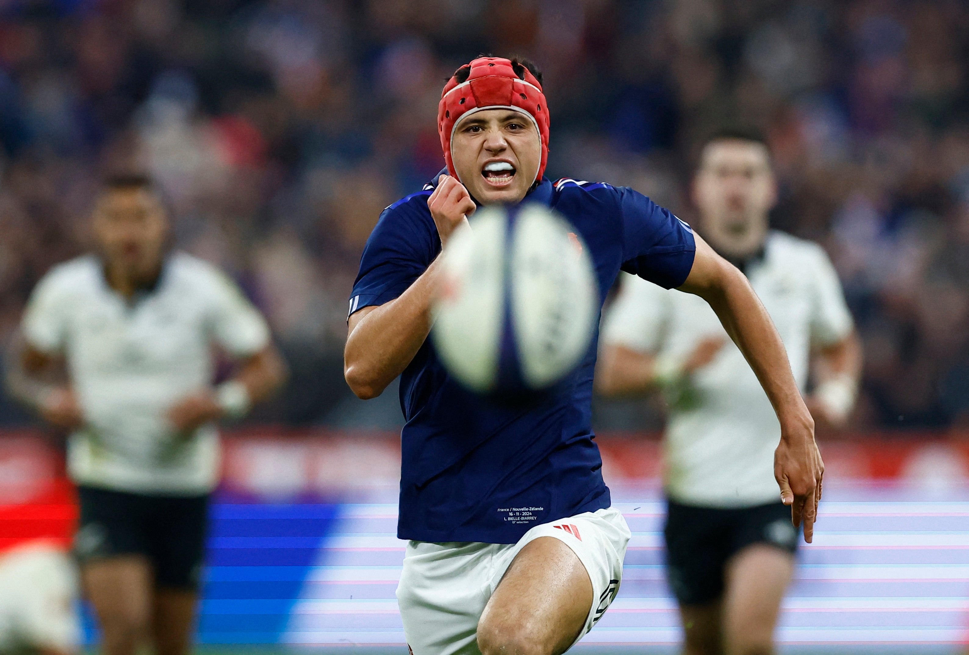 France’s Louis Bielle-Biarrey chases down a kick to score the decisive try in his side’s thrilling win over New Zealand. Photo: Reuters