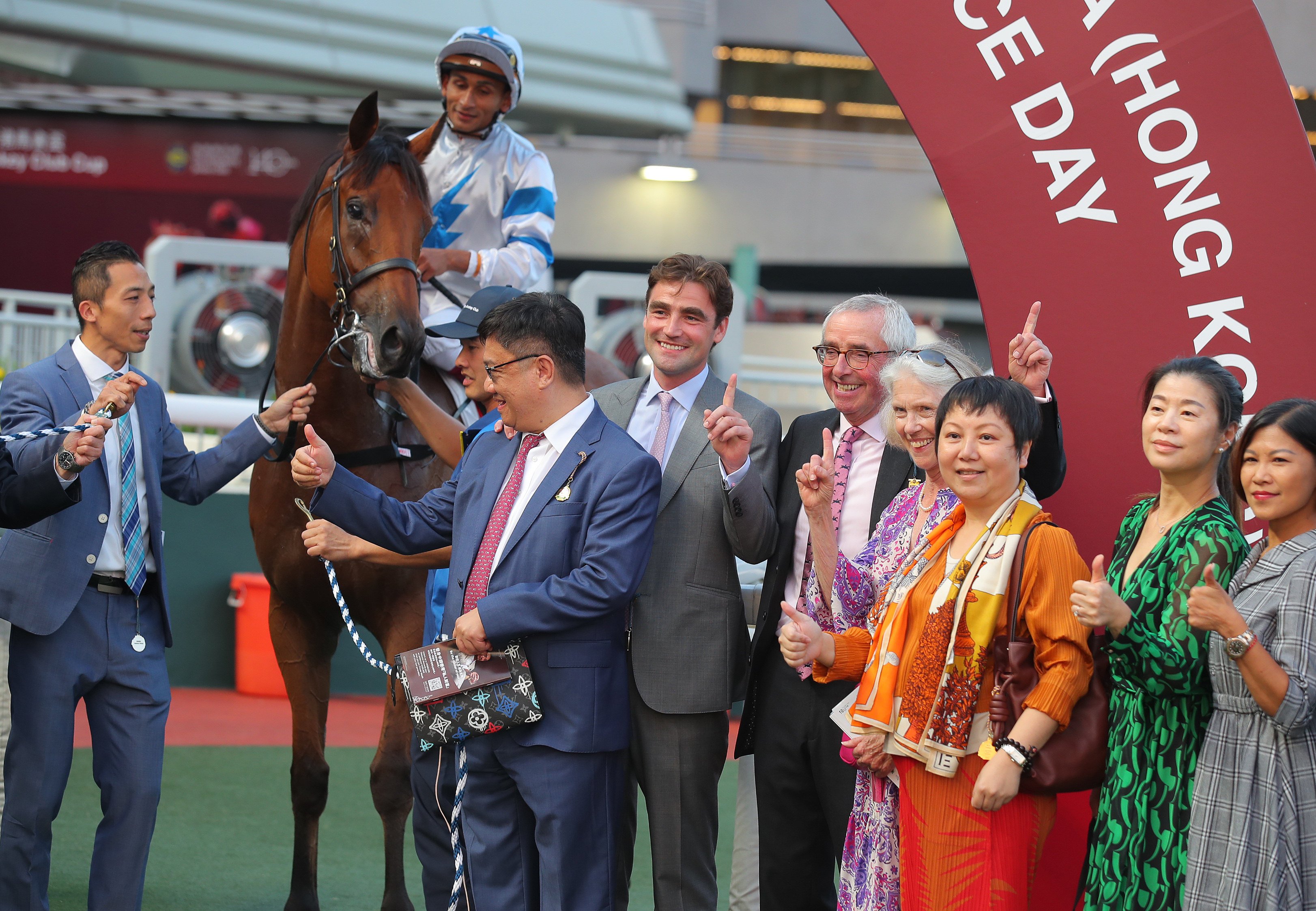 Trainer David Eustace celebrates his first Sha Tin triumph with connections of Silvery Breeze and his parents by his side. Photos: Kenneth Chan